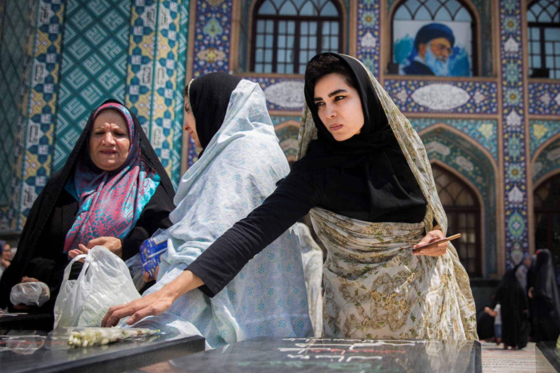 <p>Women pray at the Imamzadeh Saleh holy shrine in northern Tehran.</p>