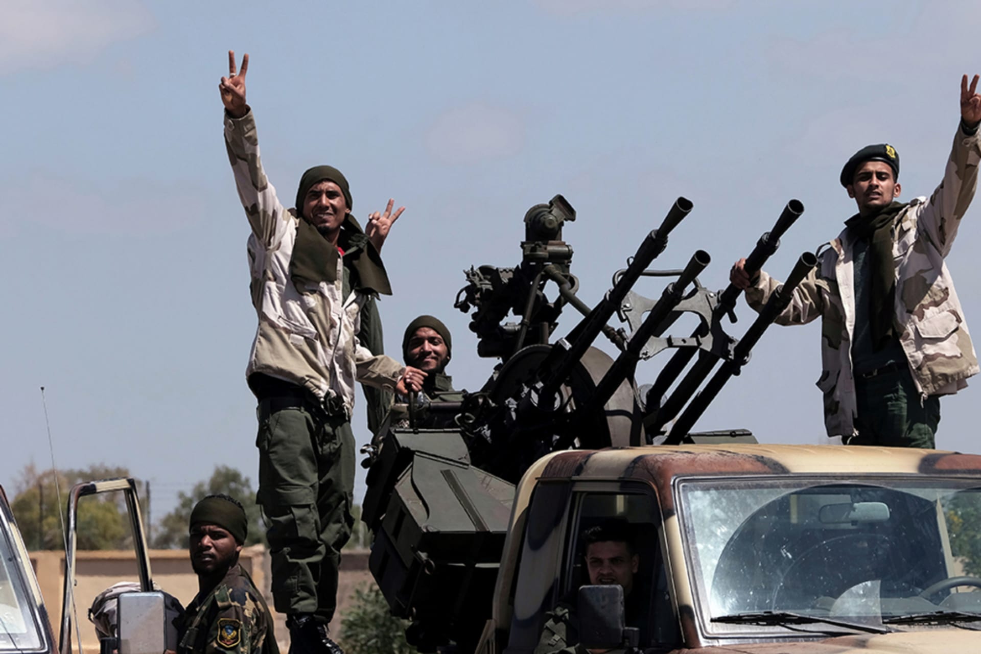 <p>Libyan National Army members, commanded by Khalifa Haftar, head out of Benghazi to reinforce troops advancing to Tripoli, April 7, 2019.</p>
