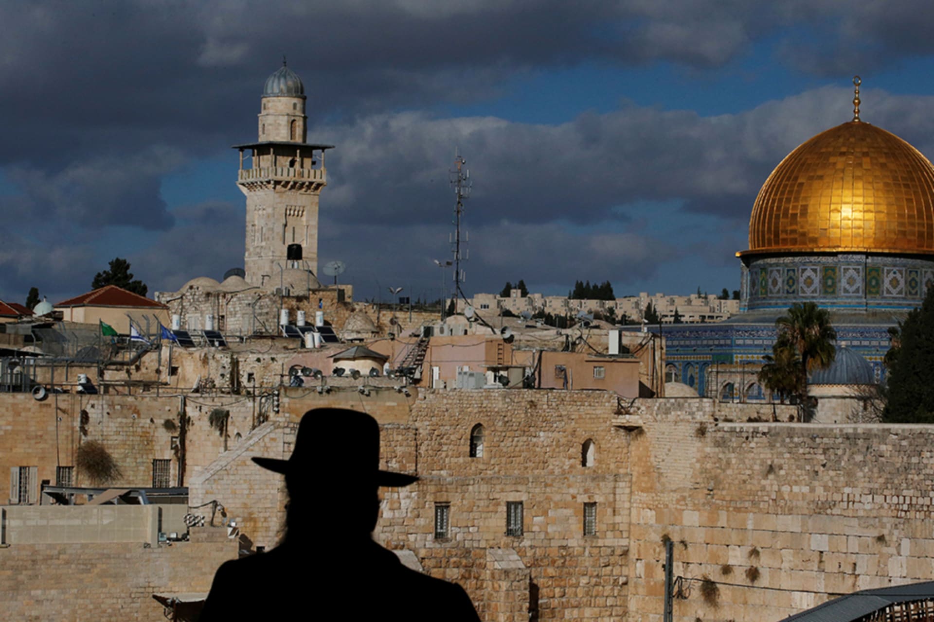<p>An Israeli man in front of the Dome of the Rock, located in Jerusalem’s occupied Old City on the compound known to Muslims as the Noble Sanctuary and to Jews as the Temple Mount.</p>
