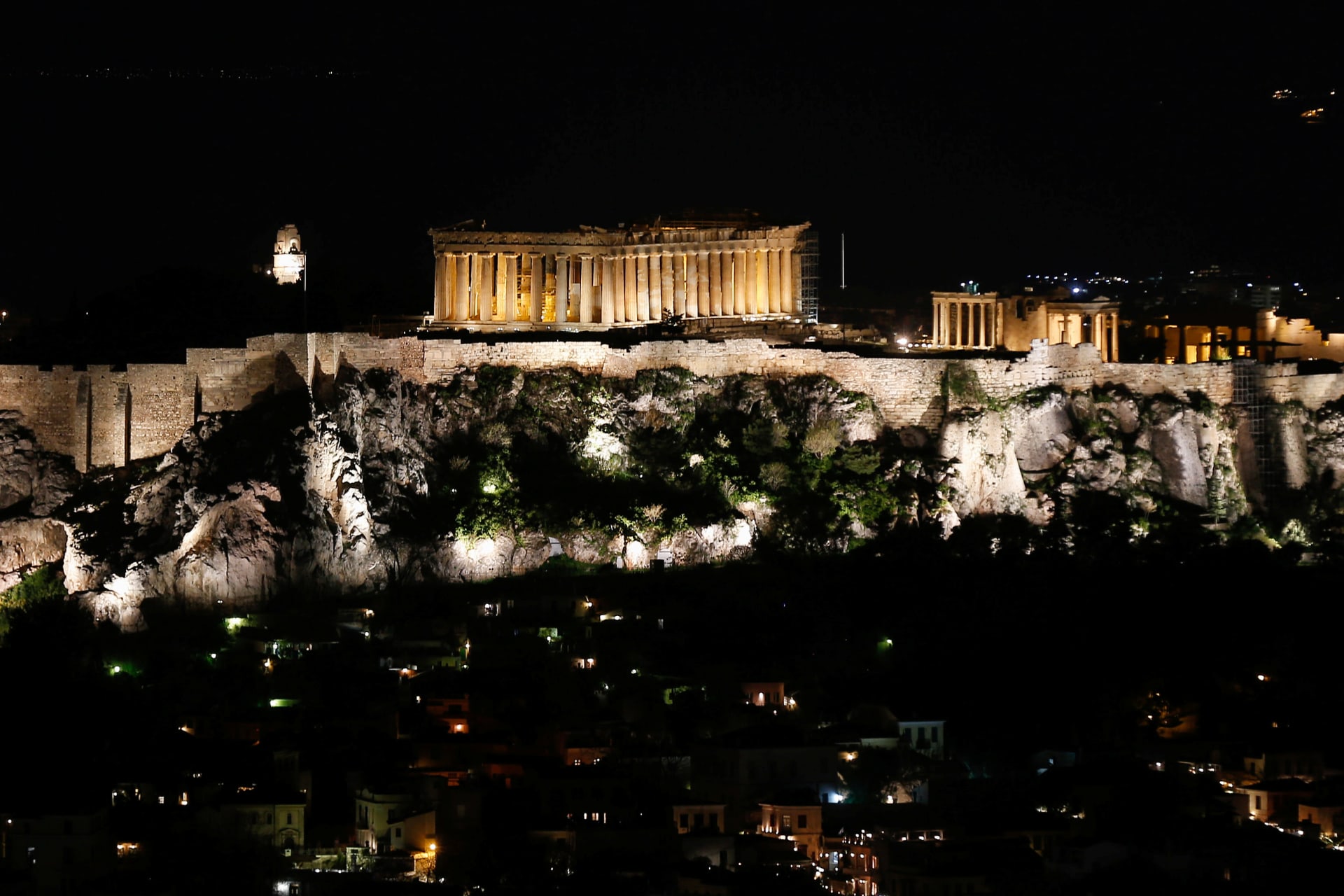 <p>The ancient Parthenon temple is pictured atop the Acropolis hill before Earth Hour in Athens, Greece, on March 30, 2019.</p>
