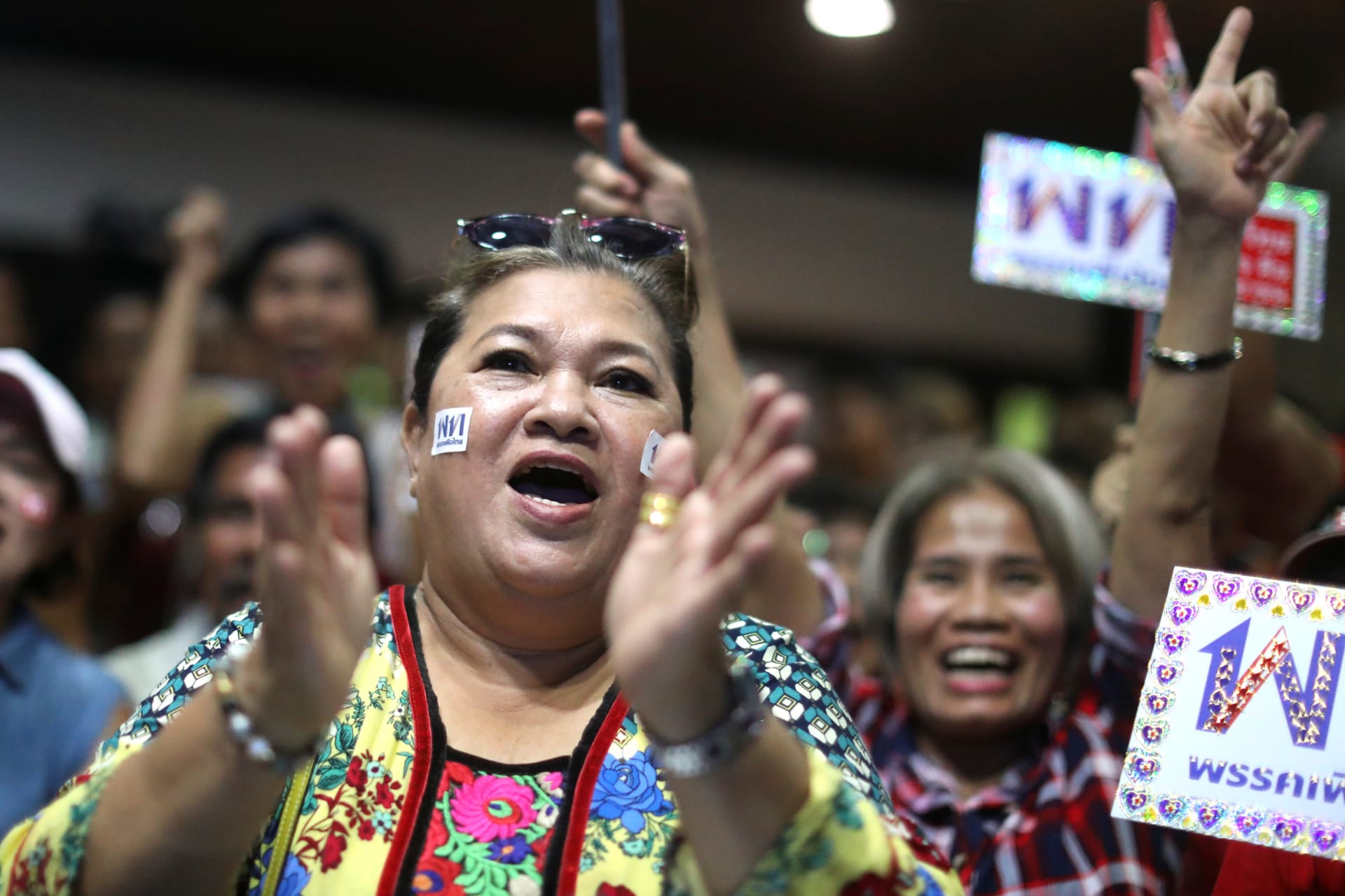 <p>Supporters of Pheu Thai Party react after unofficial results, during the general election in Bangkok, Thailand, on March 24, 2019.</p>
