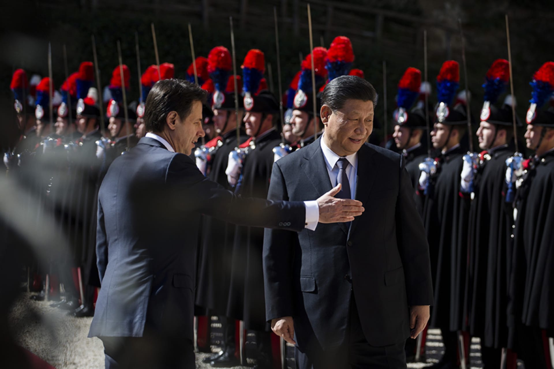 <p>Italian Prime Minister Giuseppe Conte welcomes Chinese President Xi Jinping before their meeting in Rome.</p>
