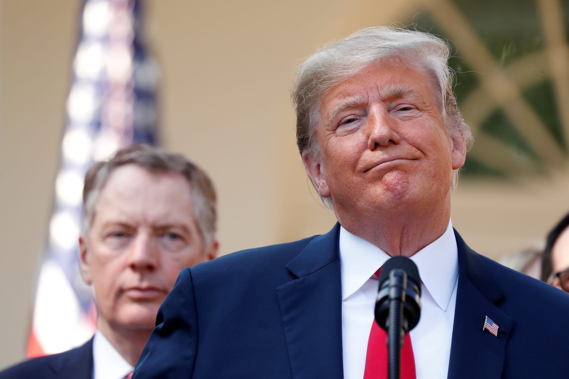 <p>U.S. President Donald J. Trump stands with U.S. Trade Representative Robert Lighthizer as he delivers remarks on the United States-Mexico-Canada Agreement during a news conference in the White House Rose Garden in Washington, DC, October 1, 2018.</p>
