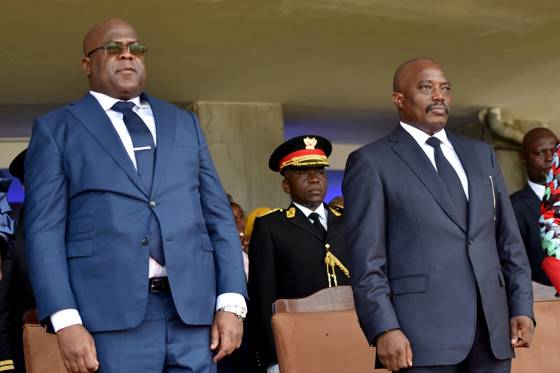 <p>Democratic Republic of Congo’s outgoing President Joseph Kabila (right) and his successor Felix Tshisekedi stand during Tshisekedi’s inauguration ceremony  in Kinshasa, Democratic Republic of Congo, on January 24, 2019.</p>

