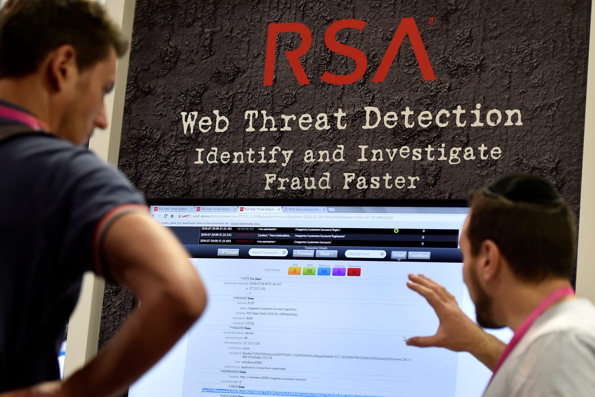 <p>An attendee listens to a demonstration at the 2016 RSA conference.</p>
