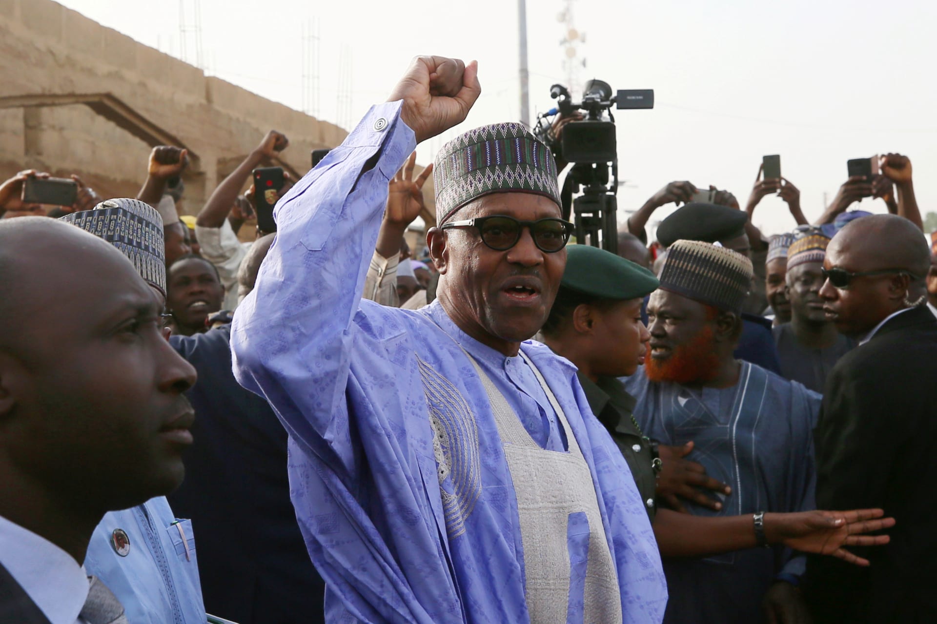 <p>Nigerian President Muhammadu Buhari gestures as he arrives to cast a vote in Nigeria’s presidential election at a polling station in Daura, Katsina State, Nigeria, February 23, 2019. </p>
