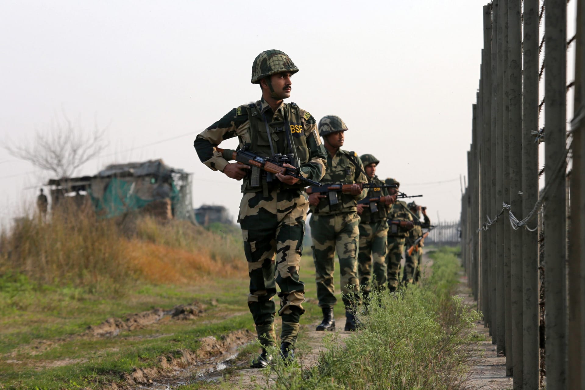 <p>India’s Border Security Force (BSF) soldiers patrol along the fenced border with Pakistan in Ranbir Singh Pura sector near Jammu February 26, 2019.</p>
