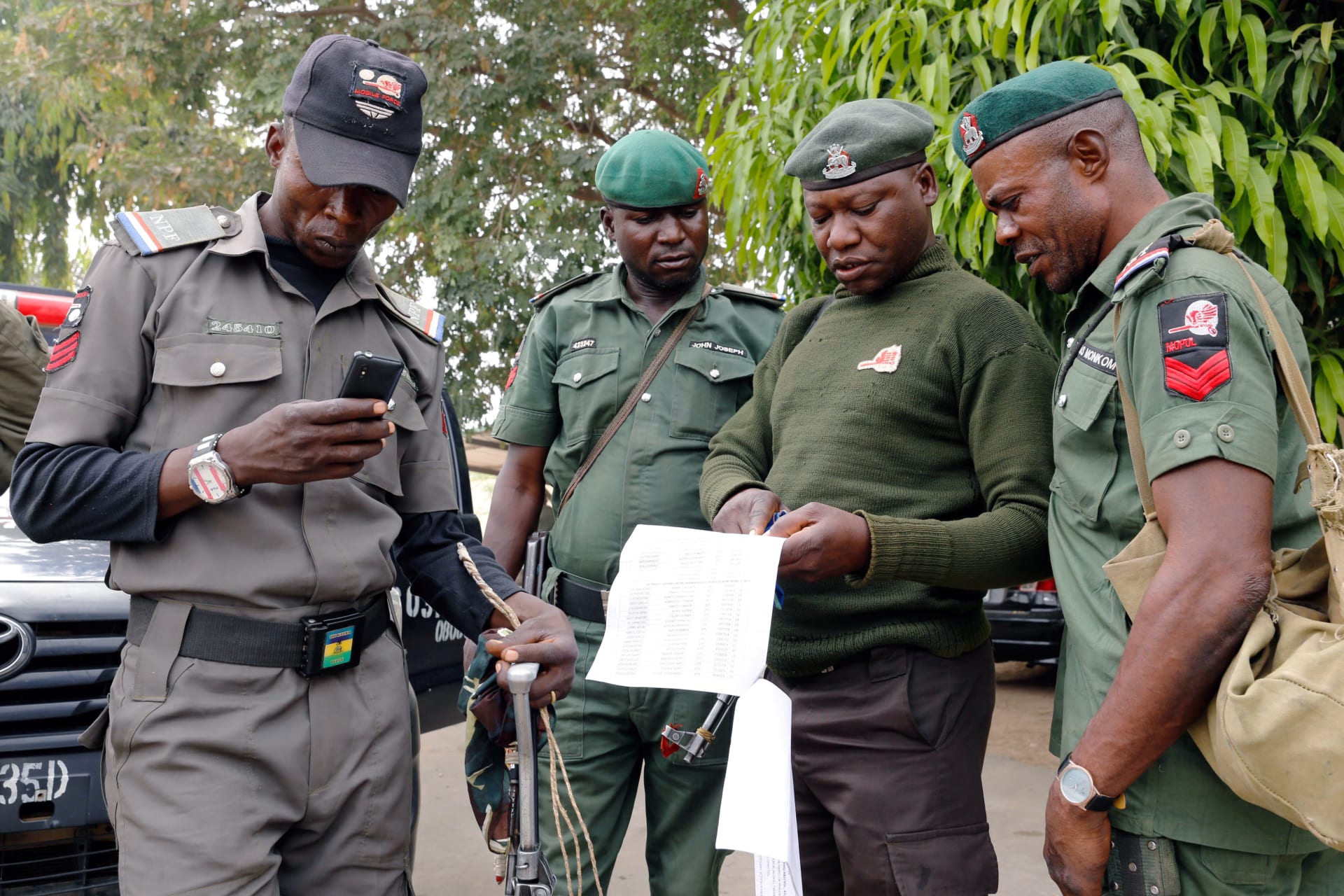 <p>Police officers at the INEC office discuss as they prepare for deployment in Adamawa State, ahead of the country’s presidential election, in Yola, Nigeria, on February 15, 2019. </p>
