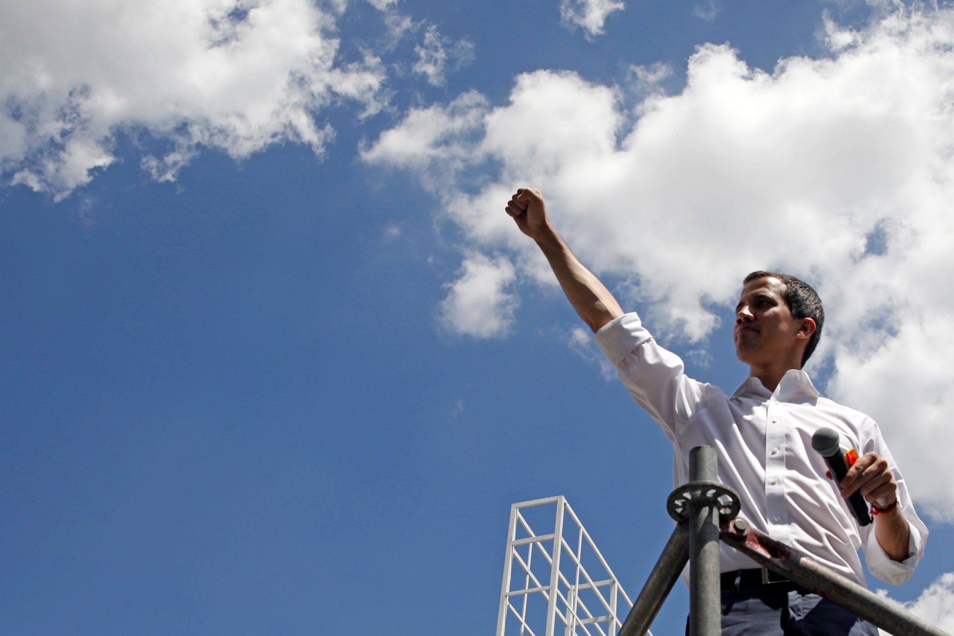 <p>Venezuelan opposition leader Juan Guaido, who many nations have recognized as the country’s rightful interim ruler, reacts during a meeting with volunteers to coordinate humanitarian aid in Caracas, Venezuela</p>
