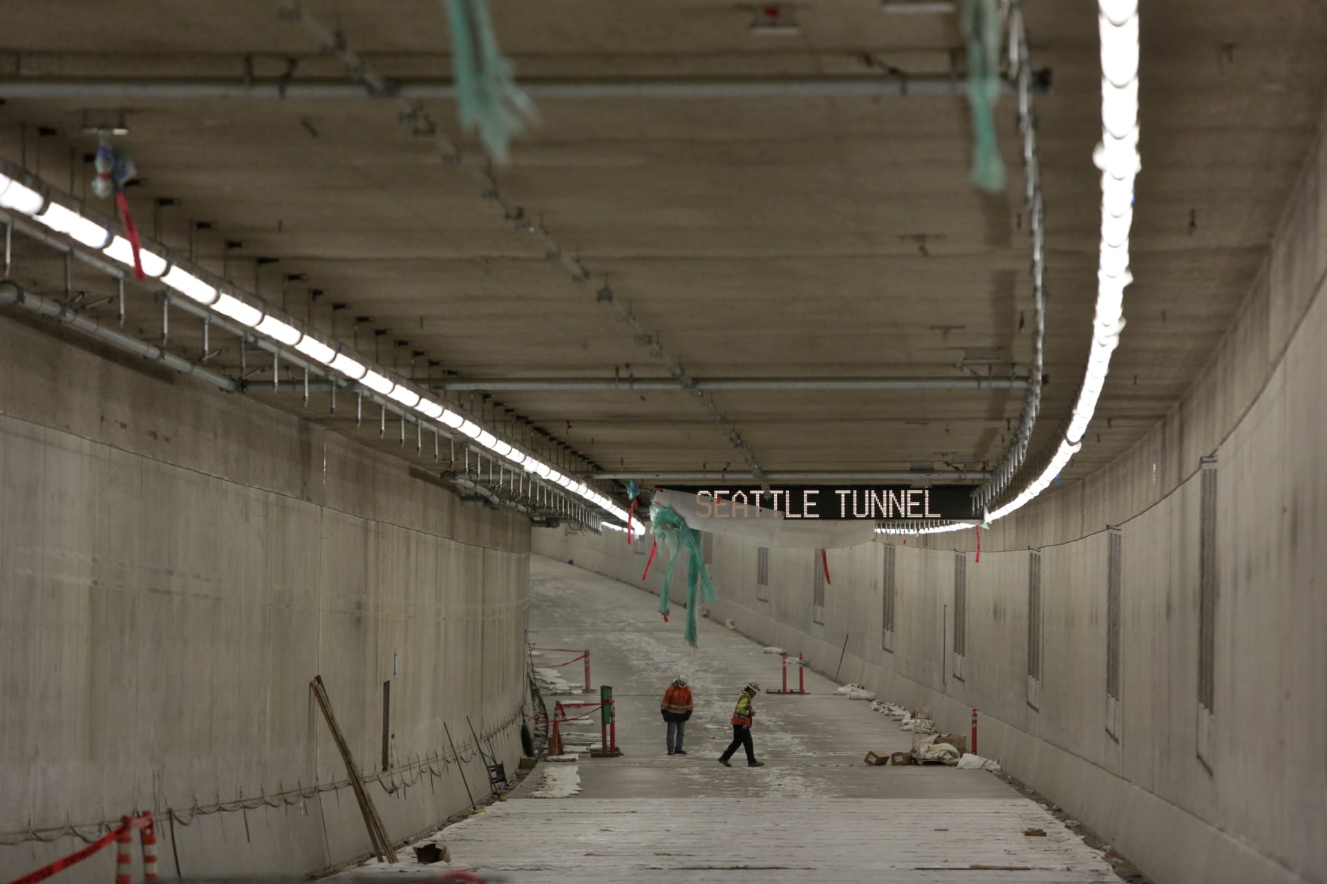 <p>Workers are pictured on the northbound lanes, at the lower level, of the double deck State Route 99 (SR 99) highway tunnel, under construction in Seattle Washington, U.S., March 27, 2018.</p>
