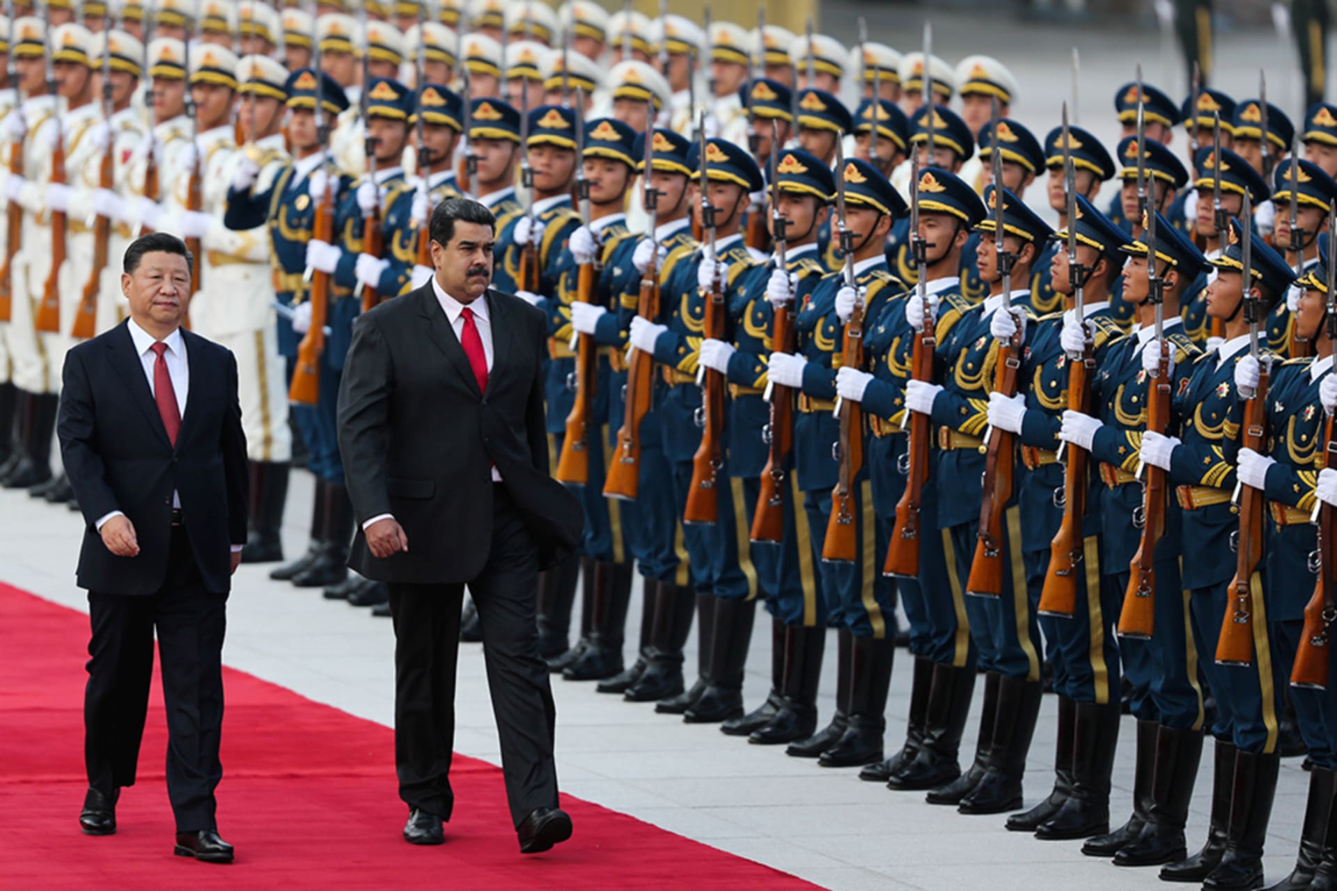 <p>Chinese President Xi Jinping walks next to Venezuela’s President Nicolas Maduro during a welcoming ceremony in Beijing in September 2018. </p>
