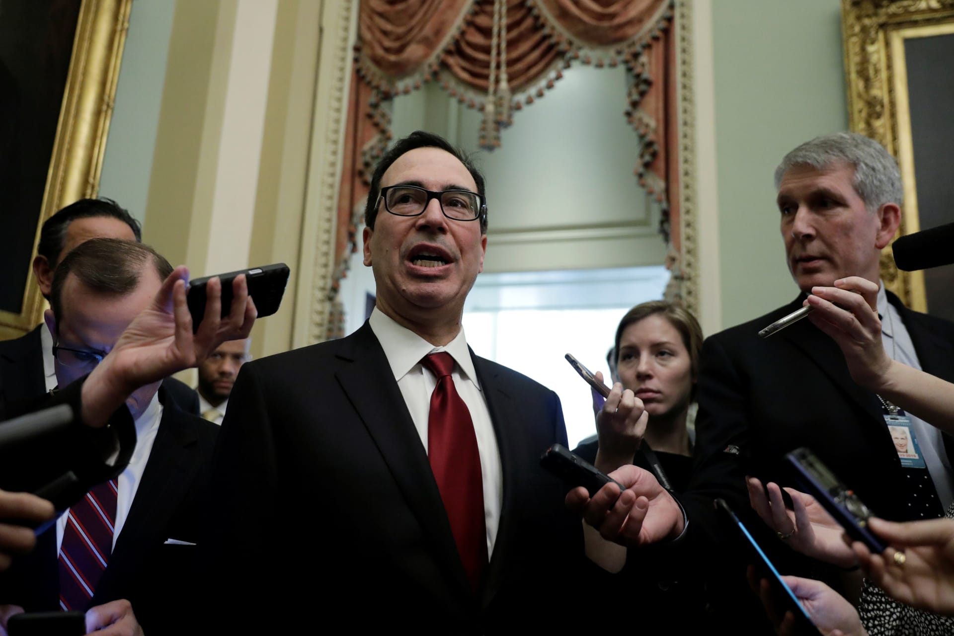 <p>Treasury Secretary Steve Mnuchin discusses sanctions relief with Capitol Hill reporters.</p>

