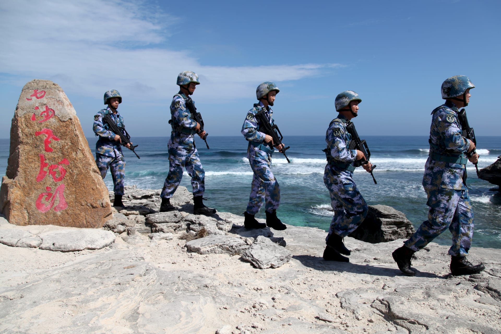 <p>Members of China’s People’s Liberation Army Navy patrol at Woody Island in the Paracel Archipelago in January 2016.</p>

