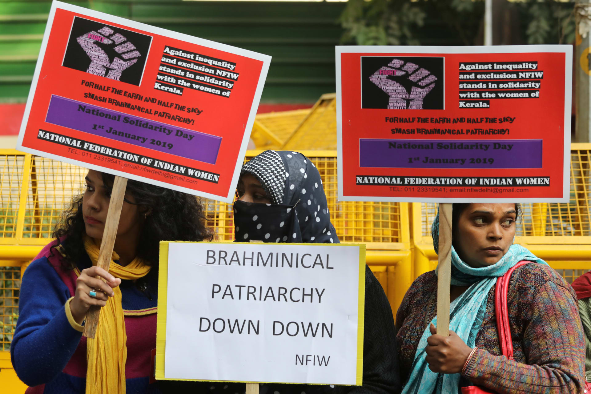 <p>Women hold placards in a solidarity rally in support of “Women’s Wall” organised by the women in the southern state of Kerala to pledge for gender equality in the southern state.</p>
