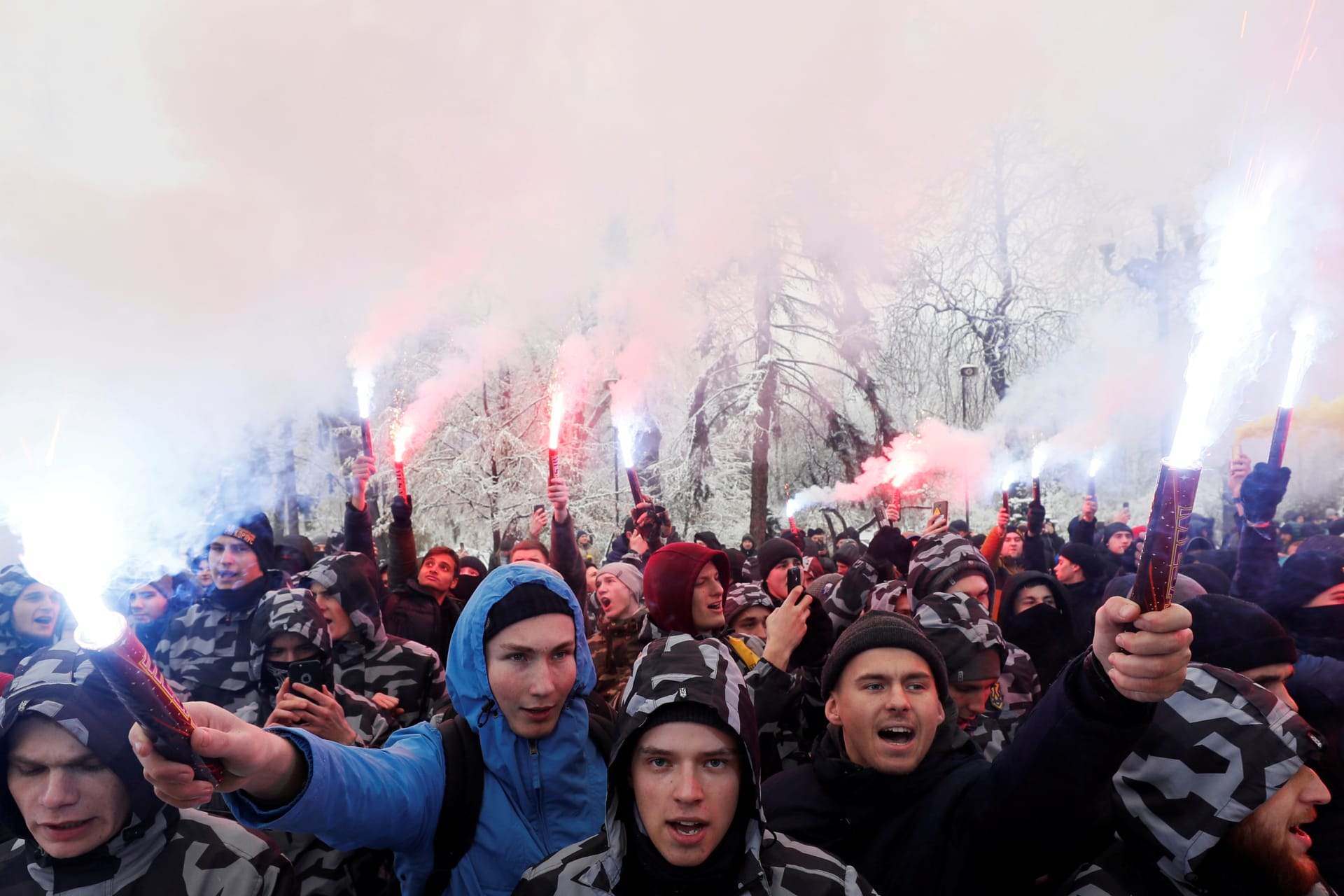 <p>Activists burn flares during a rally in Kiev to support the Ukrainian navy after Russia seized two Ukrainian armored artillery vessels and a tug boat in the Black Sea.</p>

