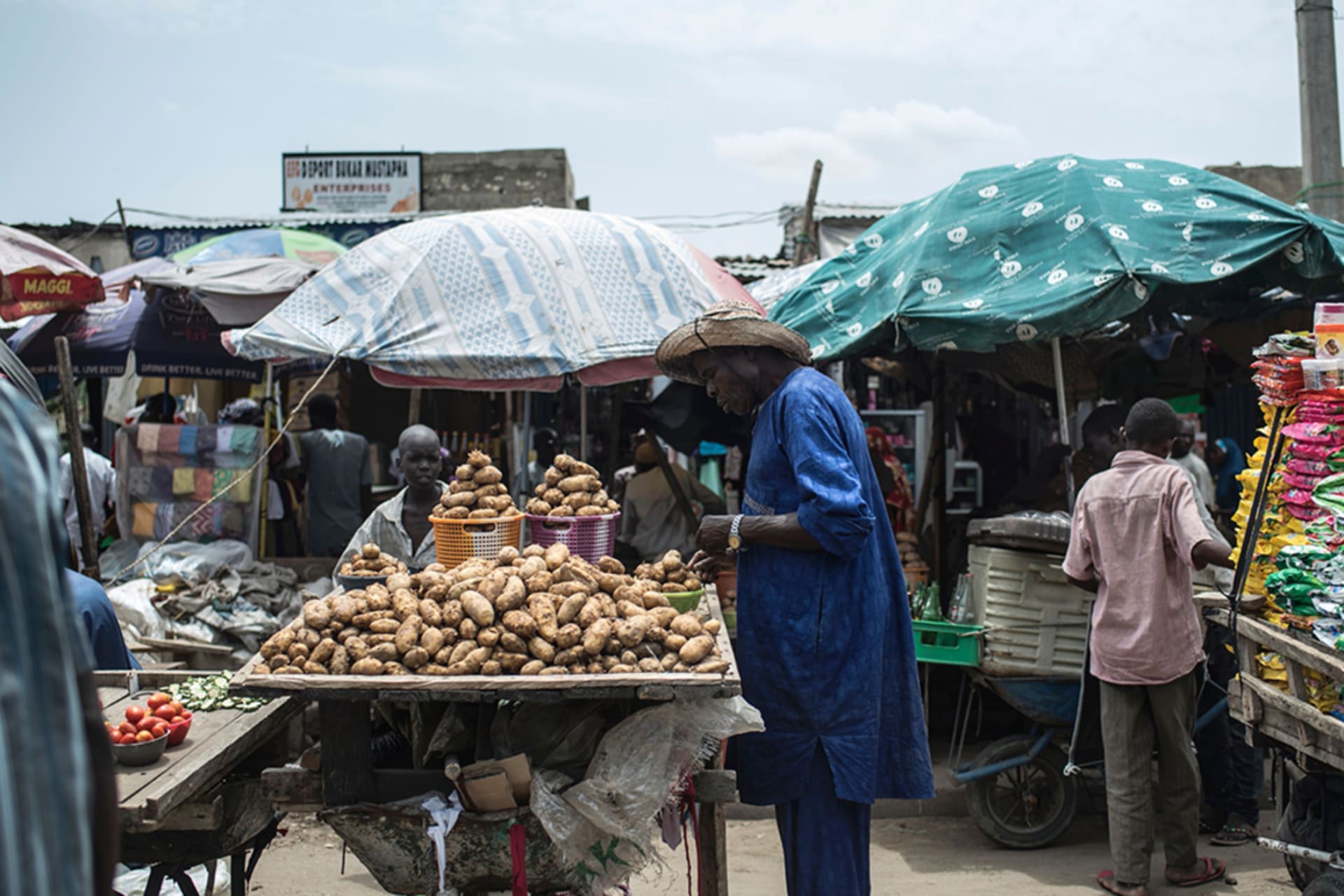 <p>A man looks at potatoes displayed on a stall at the Monday-Market, one of the biggest markets, in Maiduguri in northeastern Nigeria, on July 4, 2017. Due to the Boko Haram insurgency in Maiduguri, there has seen a sharp increase in food prices.</p>
