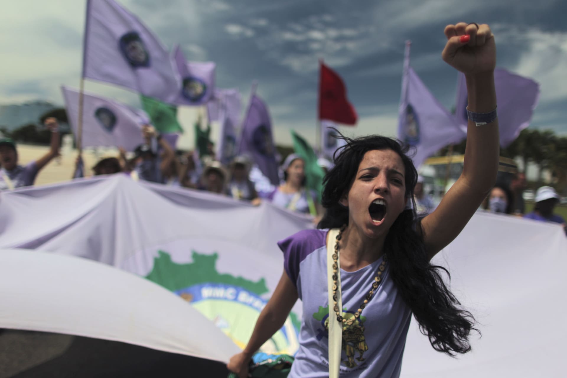 A woman protests violence against women, at the close of the National Meeting of Rural Women, in Brasilia February 21, 2013.