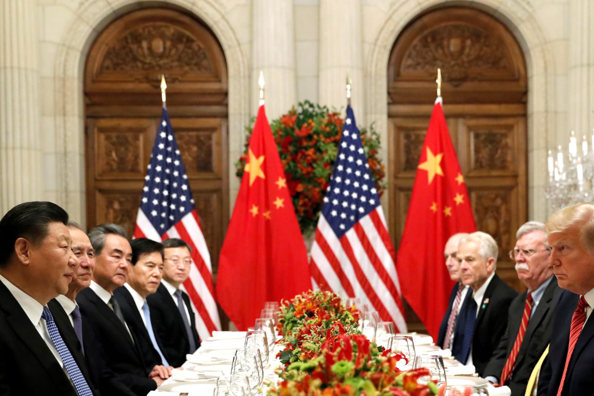<p>U.S. President Donald Trump, Trump’s national security advisor John Bolton, and Chinese President Xi Jinping attend a working dinner after the Group of Twenty leaders summit in Buenos Aires, Argentina, on December 1, 2018.</p>
