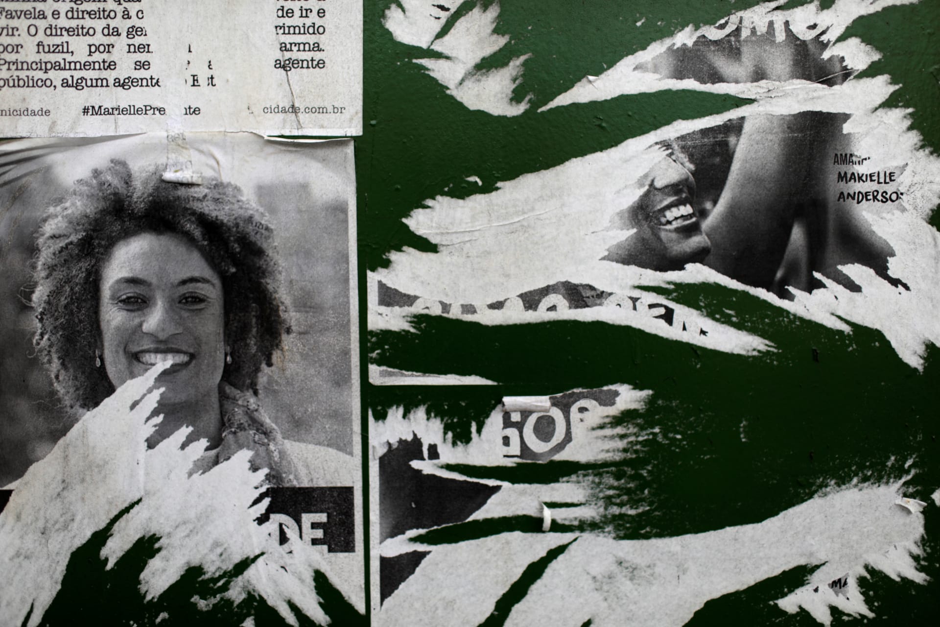 Pictures of city councilor Marielle Franco are seen, where she was killed in Rio de Janeiro, May 9, 2018. REUTERS/Ricardo Moraes