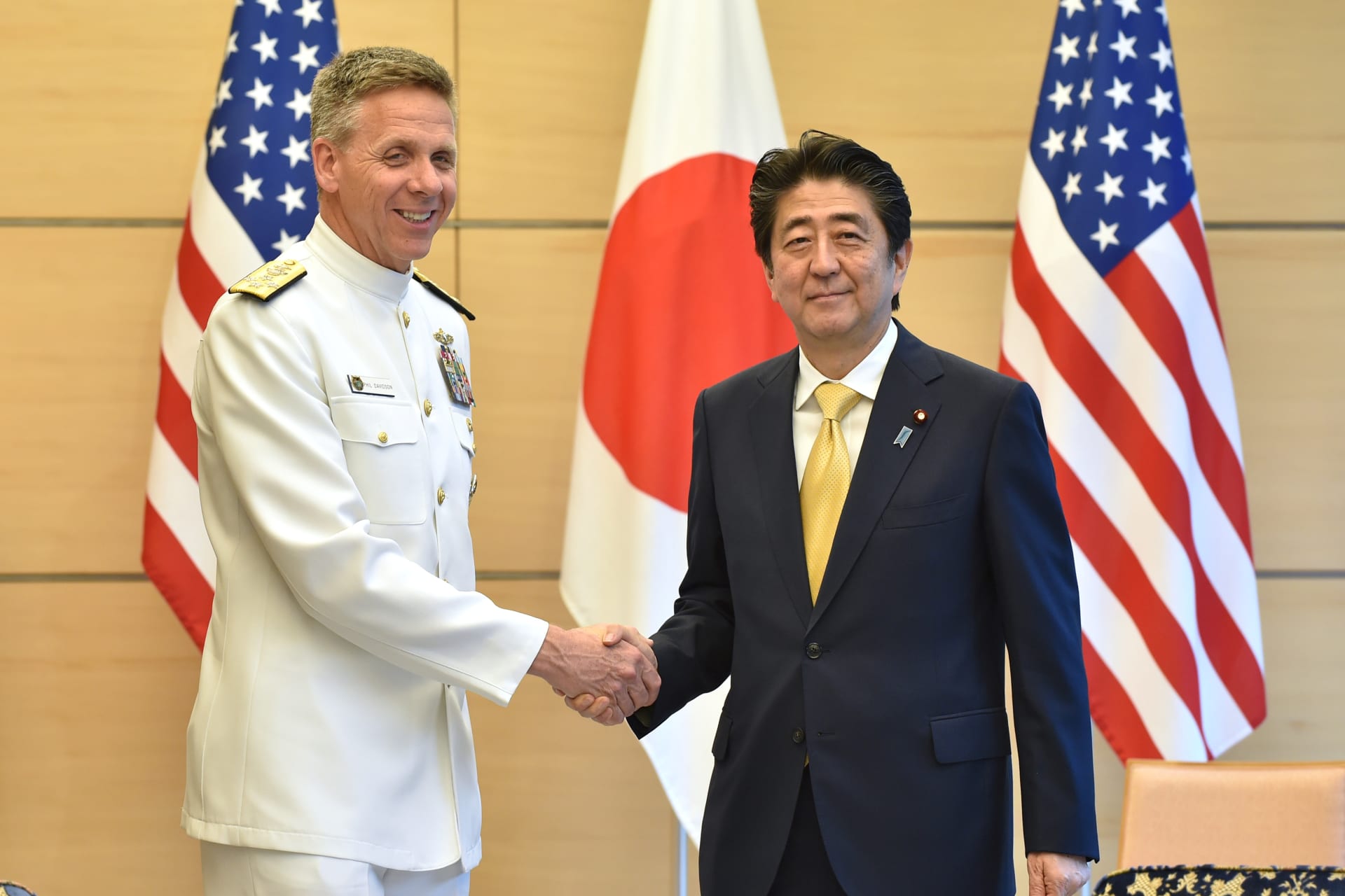 <p>Admiral Phil Davidson, commander of U.S. Indo-Pacific Command, shakes hands with Japan’s Prime Minister Shinzo Abe at Abe’s office in Tokyo, Japan.</p>
