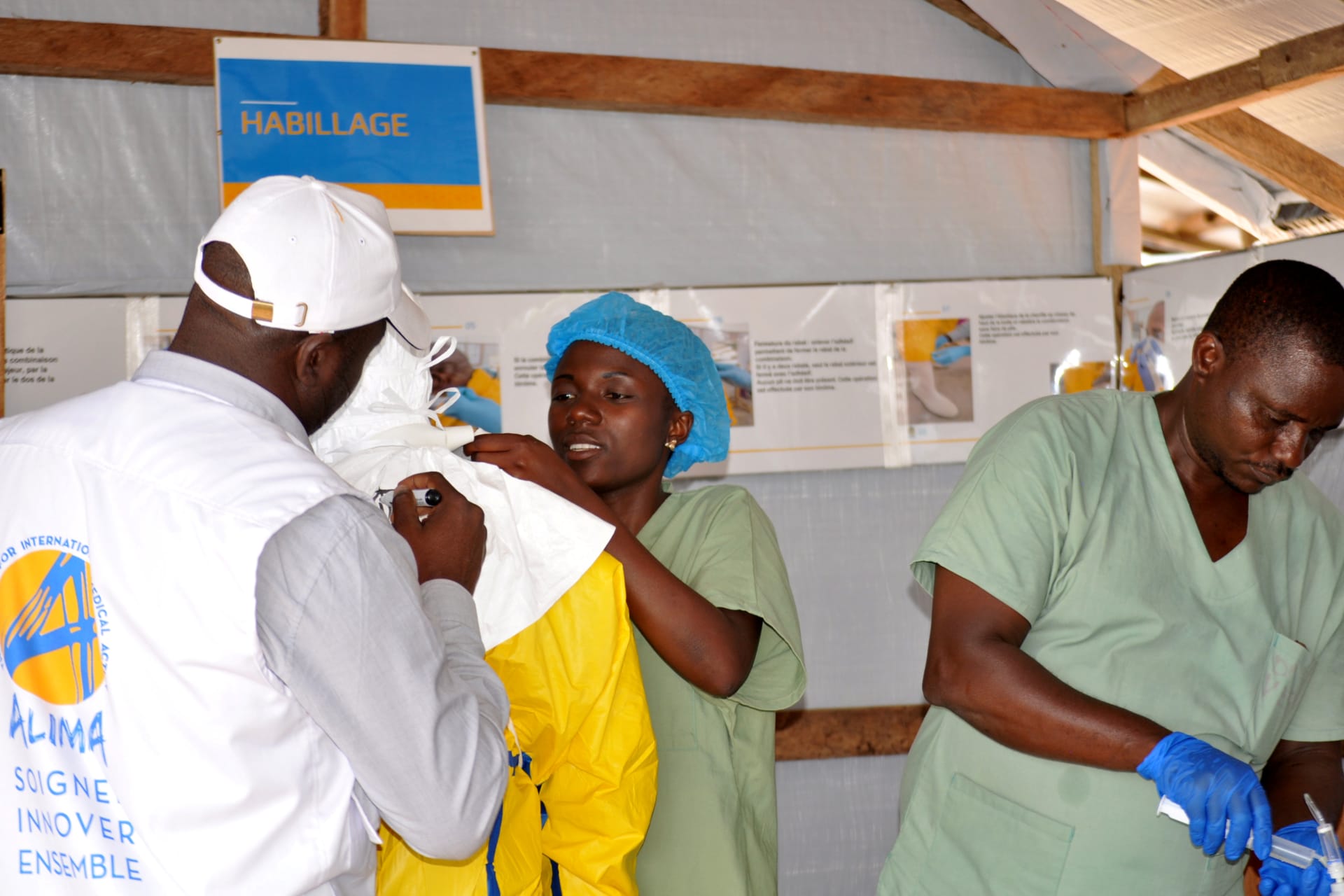 <p>Medical team wear protective suits as they prepare to administer Ebola patient care at The Alliance for International Medical Action (ALIMA) treatment center in Beni, North Kivu province of Democratic Republic of Congo, on September 6, 2018.</p>
