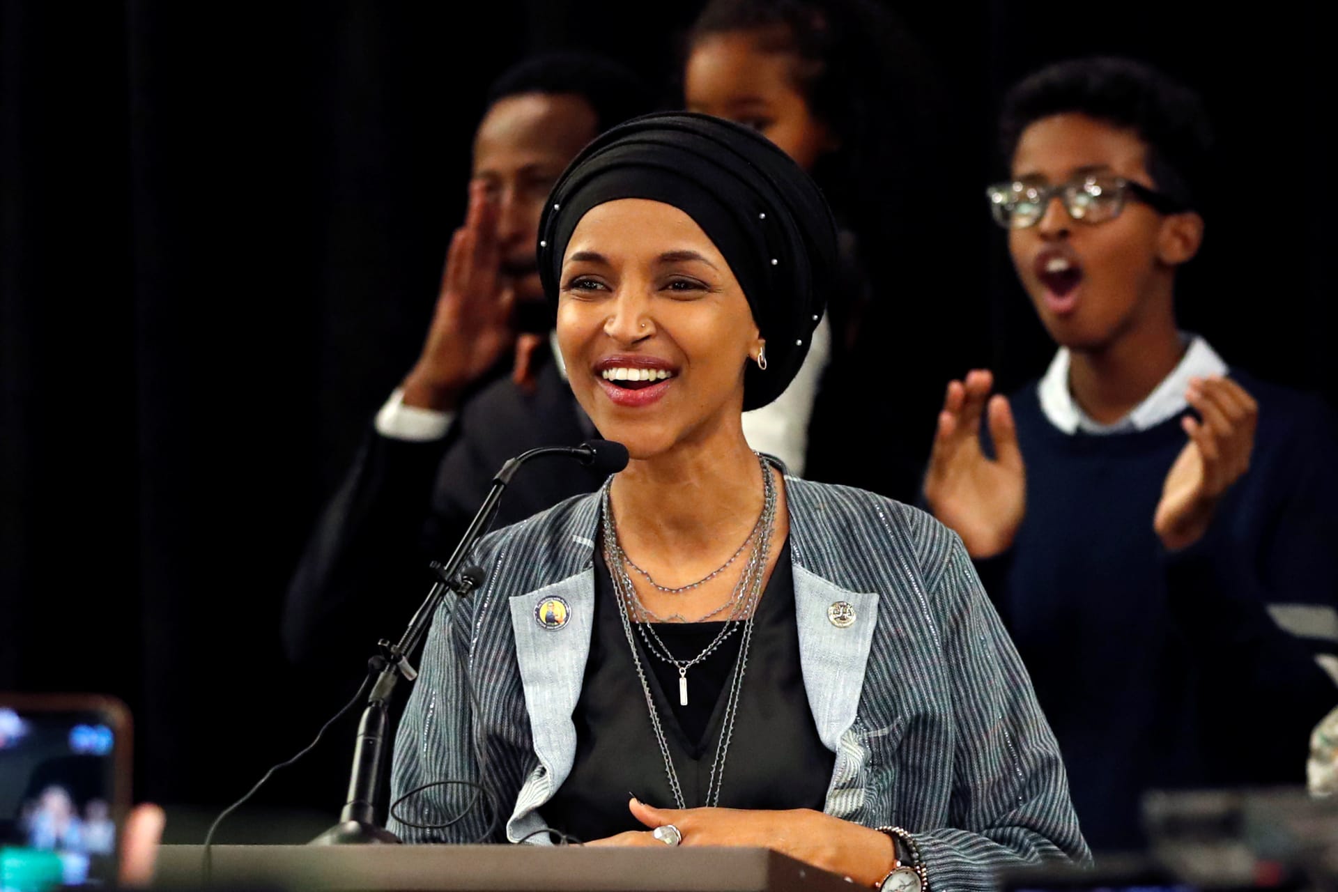 <p>Democratic congressional candidate Ilhan Omar reacts after appearing at her midterm election night party in Minneapolis, Minnesota.</p>
