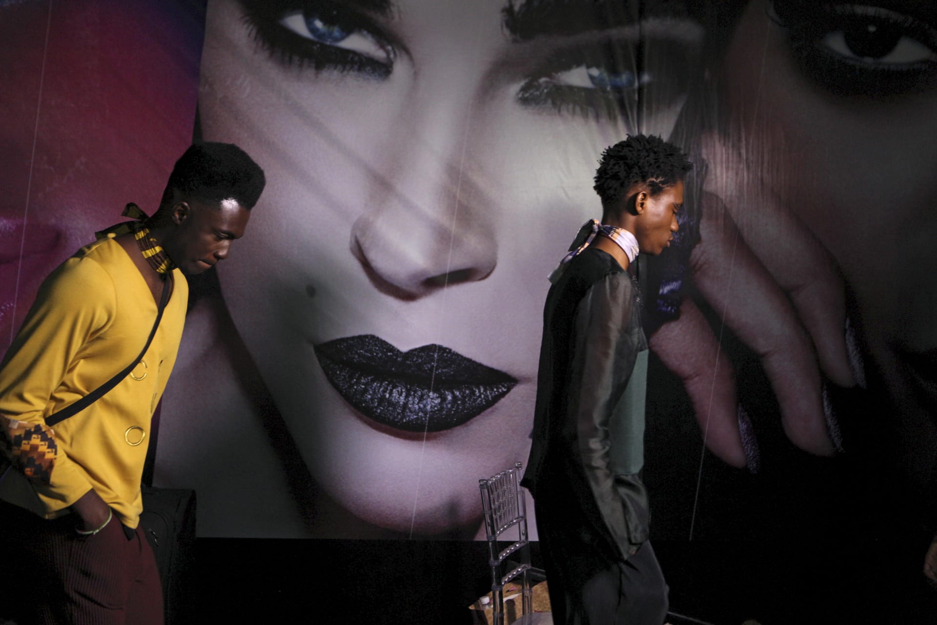 <p>Models wearing clothes designed by Orange Culture leave the backstage at Lagos Fashion and Design Week in Lagos, Nigeria, on October 29, 2015.</p>