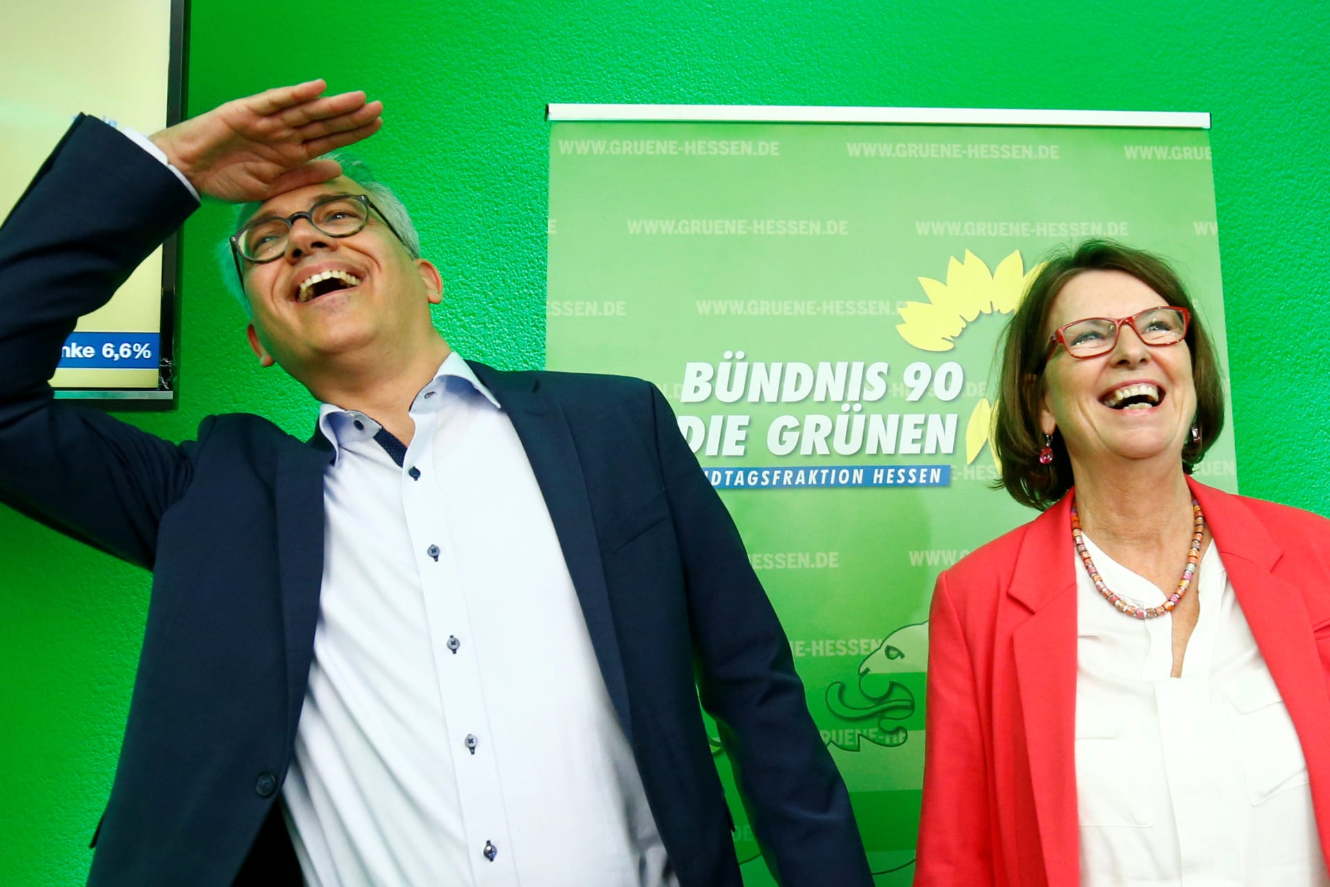 <p>Green party top candidate and Minister of Economics, Energy, Transport and Regional Development of Hesse Tarek Al-Wazir and Minister For The Environment, Climate Protection, Agriculture And Consumer Protection of Hesse Priska Hinz react on first exit poll</p>
