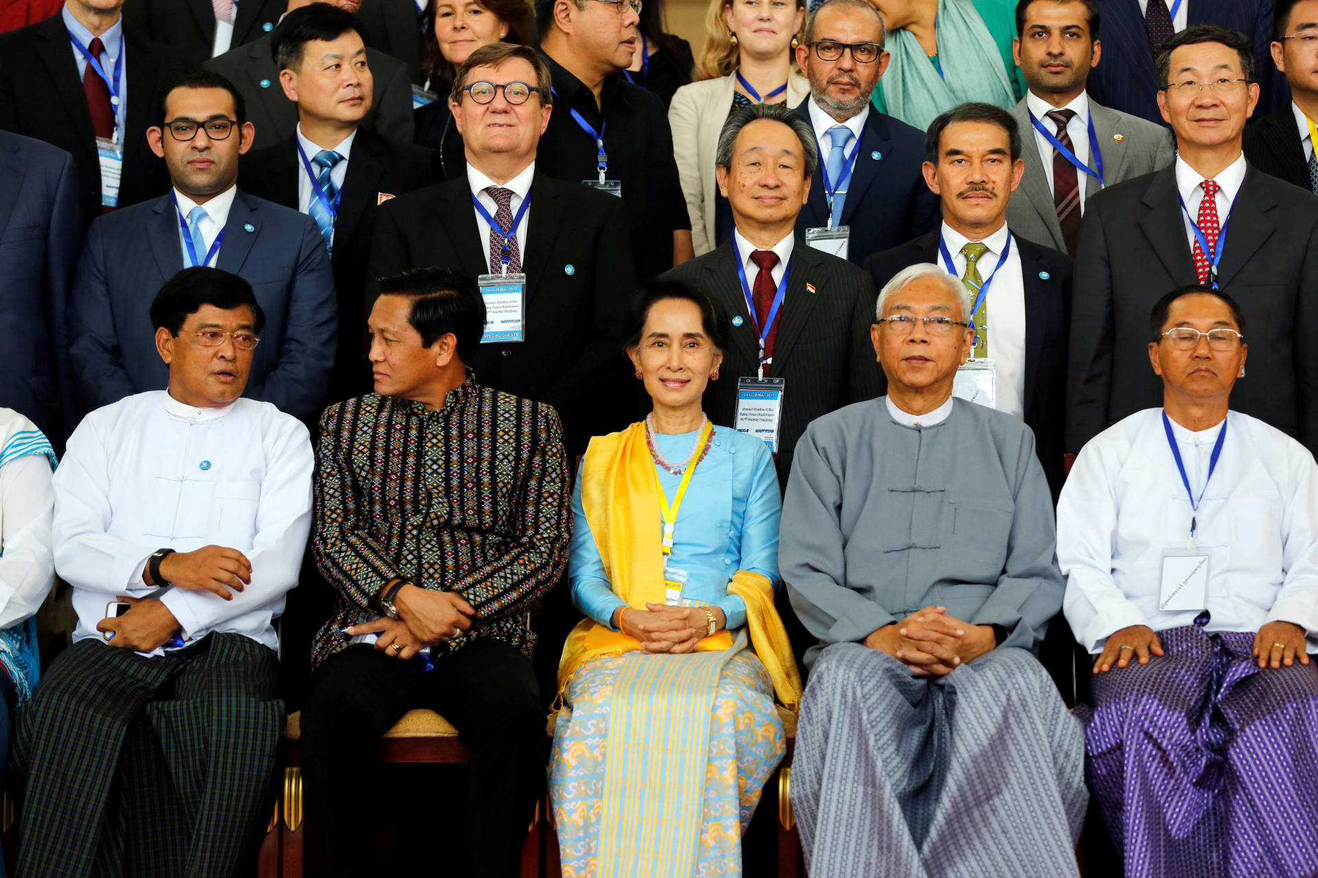 <p>Myanmar State Counselor Aung San Suu Kyi (C) and Myanmar’s president Htin Kyaw (2nd R) pose for photo after opening ceremony of 21st Century Panglong conference in Naypyitaw, Myanmar on May 24, 2017.</p>
