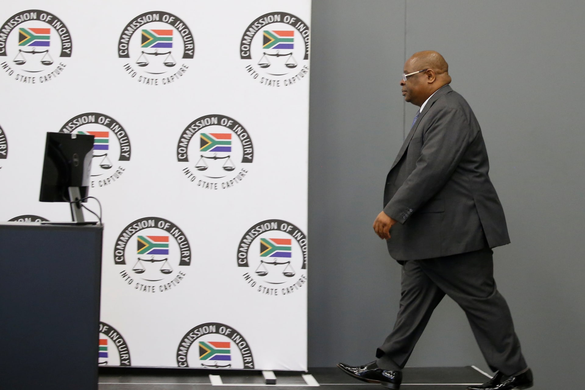 <p>Deputy Chief Justice Raymond Zondo arrives ahead of the Judicial Commission of Inquiry probing state capture in Johannesburg, South Africa on August 24, 2018.</p>
