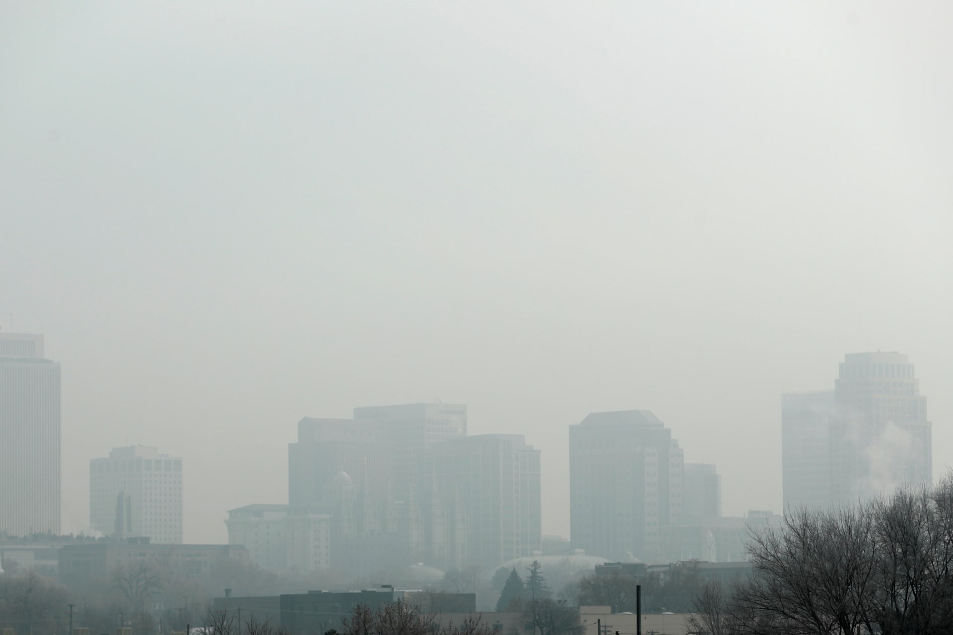 Tall buildings are shrouded in smog in downtown Salt Lake City