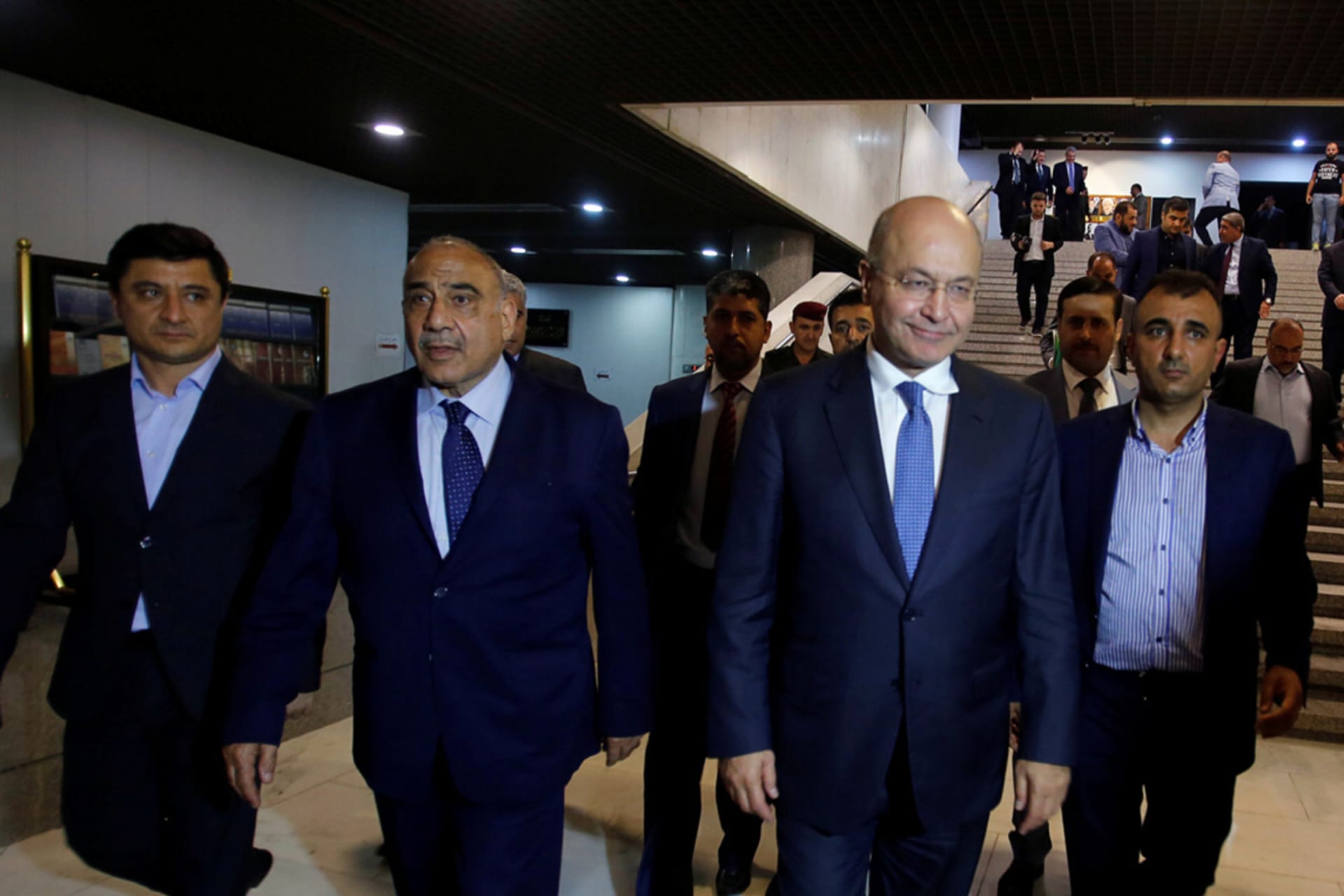 <p>Barham Salih, Iraq’s new president, walks with new Prime Minister Adel Abdul-Mahdi at the parliament headquarters in Baghdad.</p>
