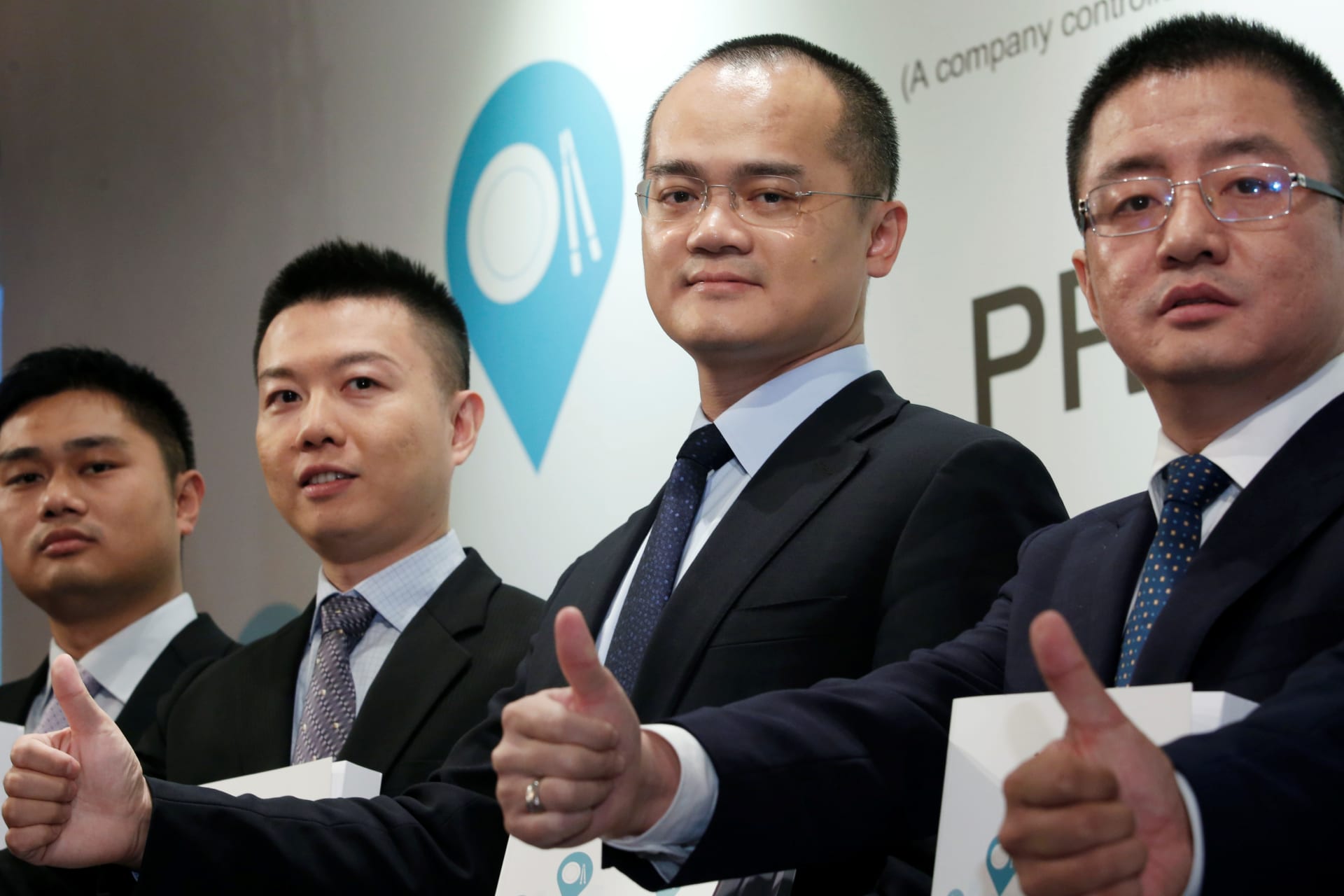 <p>Chairman and CEO Wang Xing and executives of China’s Meituan Dianping attend a news conference celebrating the company’s IPO.</p>
