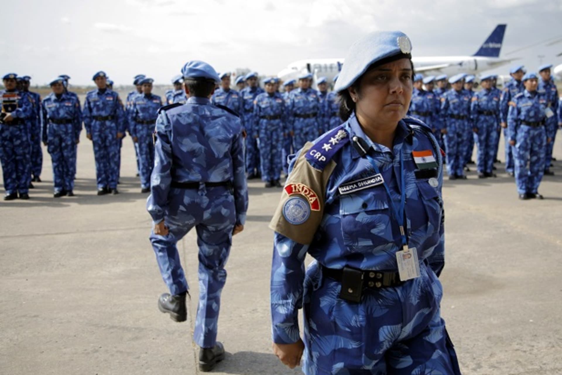 <p>The first all-female unit of United Nations peacekeepers stand at attention as they arrive at Roberts International Airport outside Liberia’s capital Monrovia January 30, 2007. </p>
