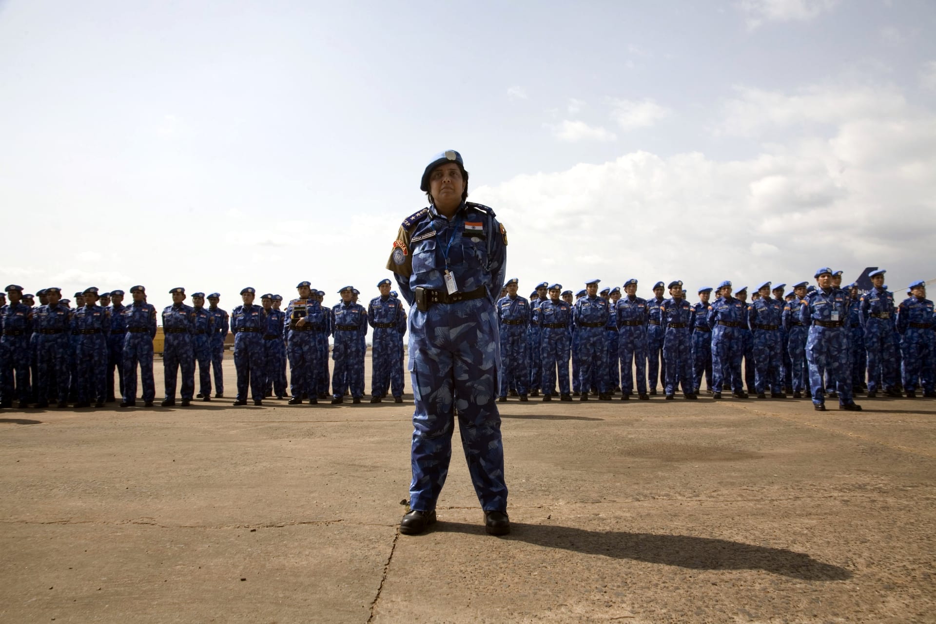 <p>An Indian officer from the first all-female unit of UN peacekeepers stands in front of troops outside Liberia’s capital Monrovia. January 30, 2007.</p>
