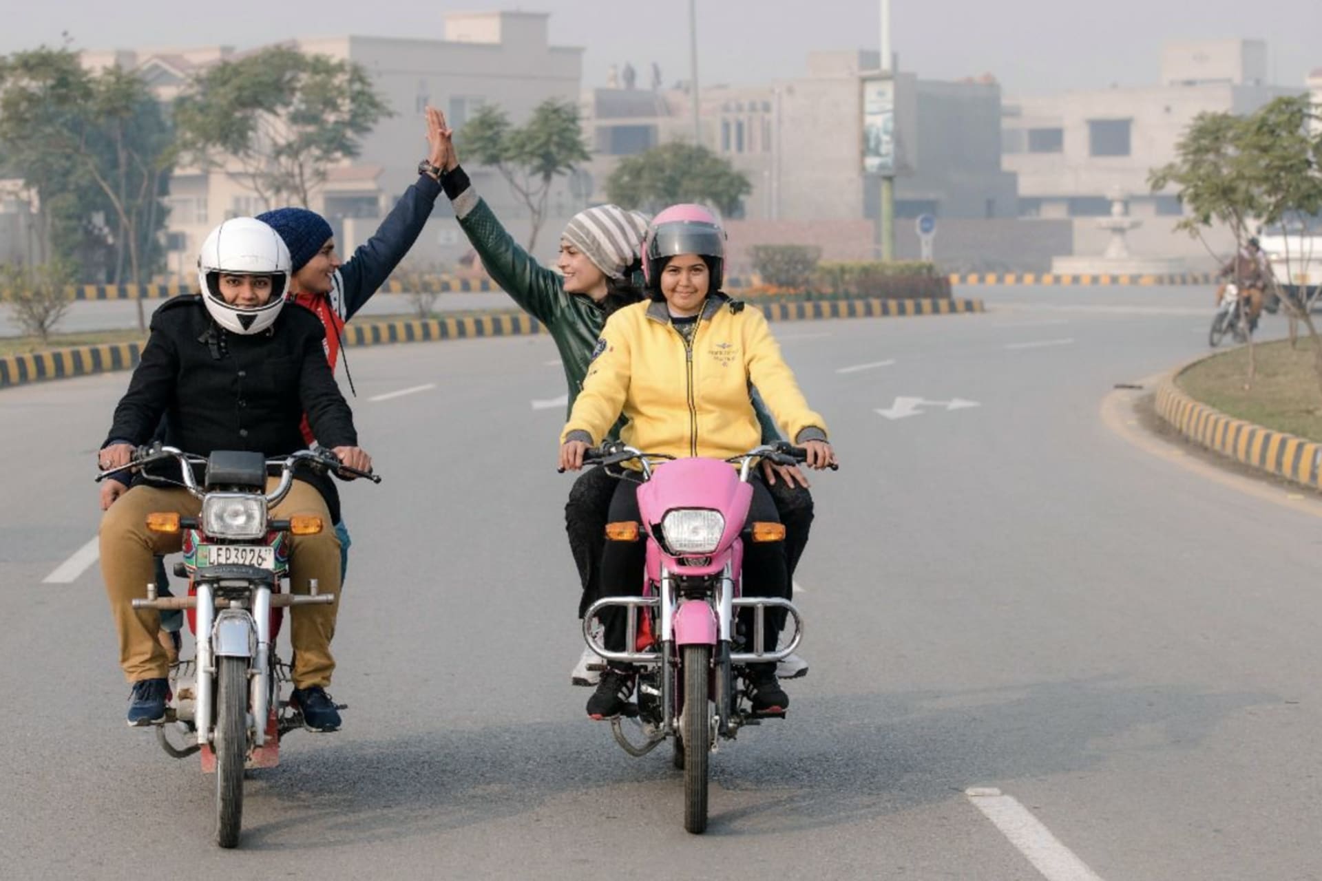 <p>Pakistani women bikers participate in the “Women on Wheels” initiative, launched by Punjab’s Strategic Reform Unit.</p>
