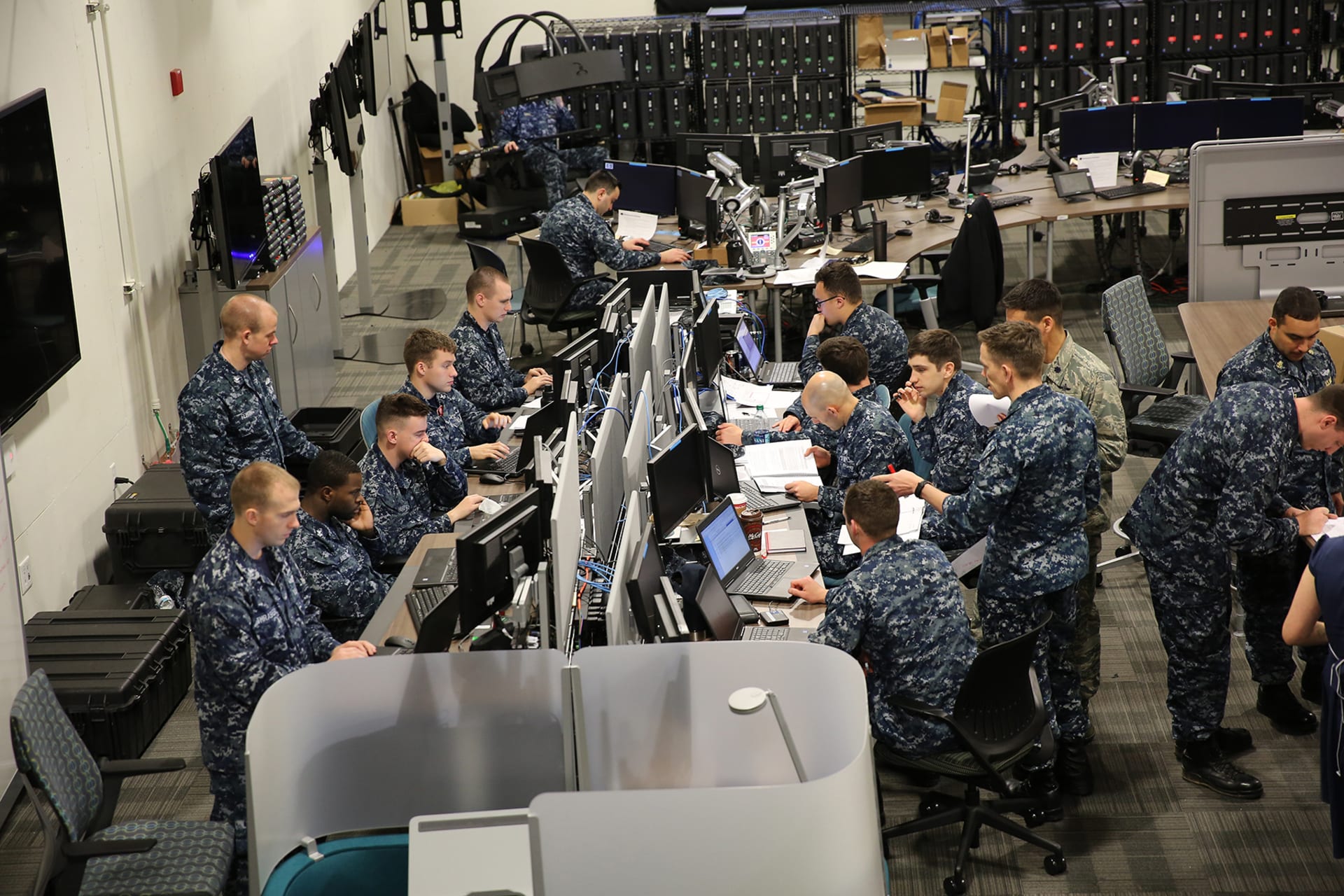 <p>Sailors work together at a joint cyber training center during an April 2017 exercise at Fort Meade.</p>
