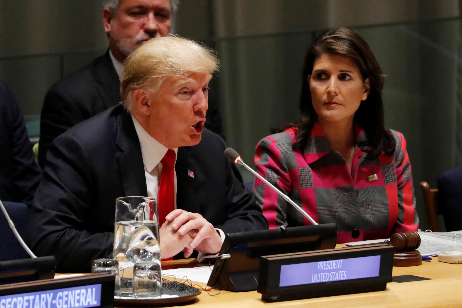 <p>U.S. President Donald J. Trump speaks as UN Ambassador Nikki Haley looks on at the United Nations Global Call to Action on the World Drug Problem during the UN General Assembly in New York on September 24, 2018.</p>
