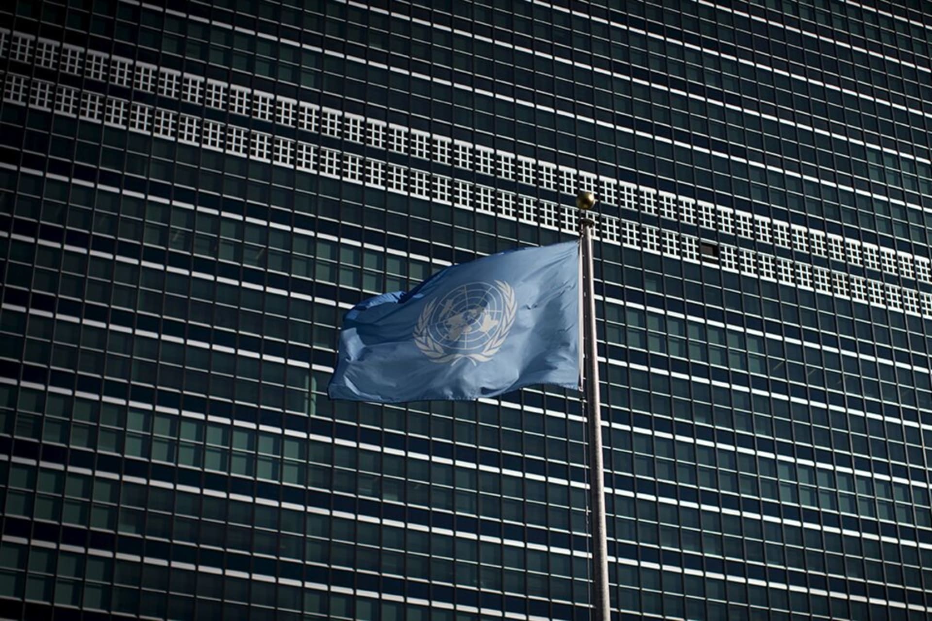 <p>The United Nations flag flies in front of the organization’s headquarters in New York in 2015.</p>
