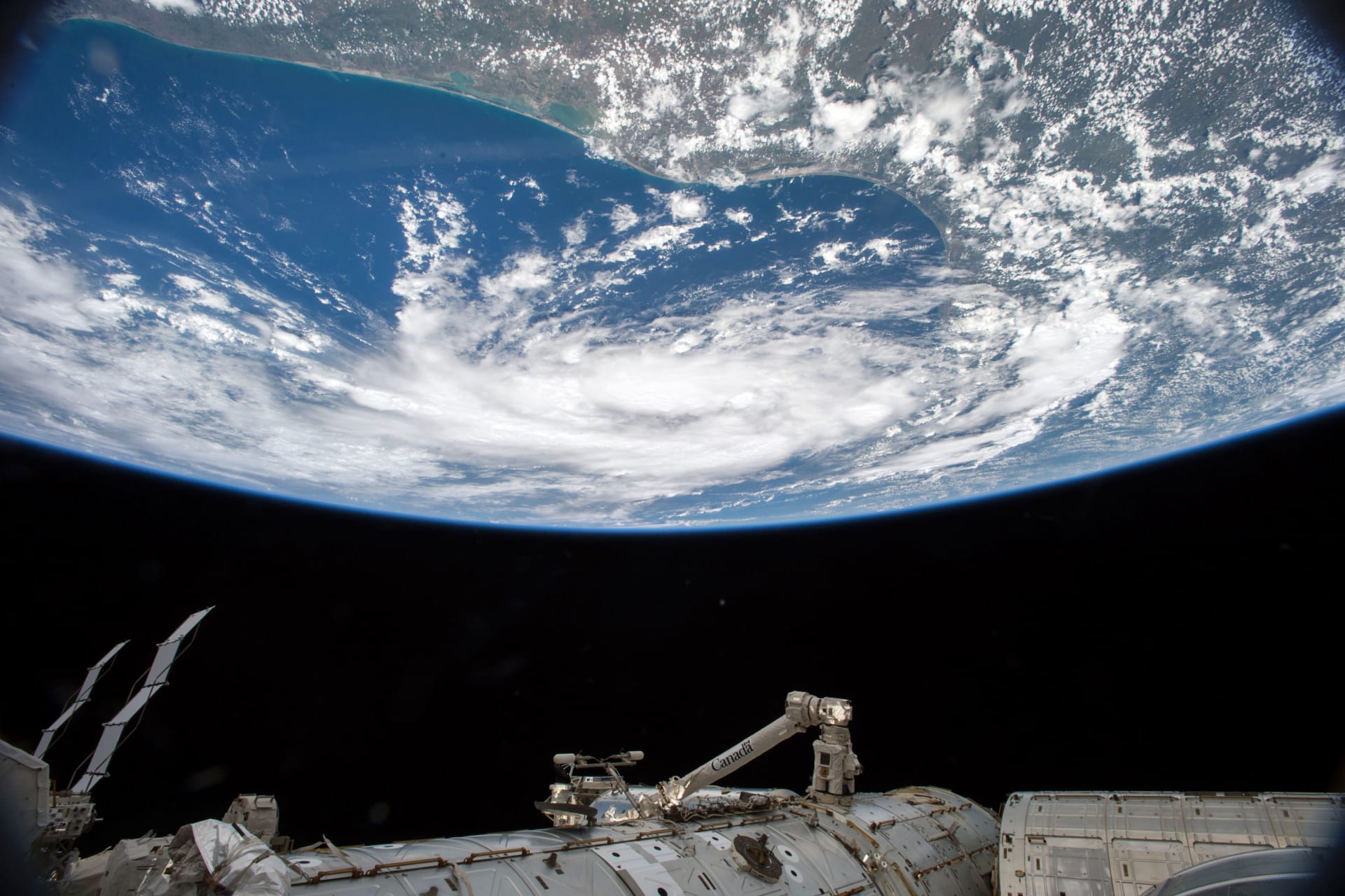 <p>NASA astronaut Scott Kelly, while aboard the International Space Station, captures a photo of a tropical storm in the Gulf of Mexico on June 15, 2015.</p>
