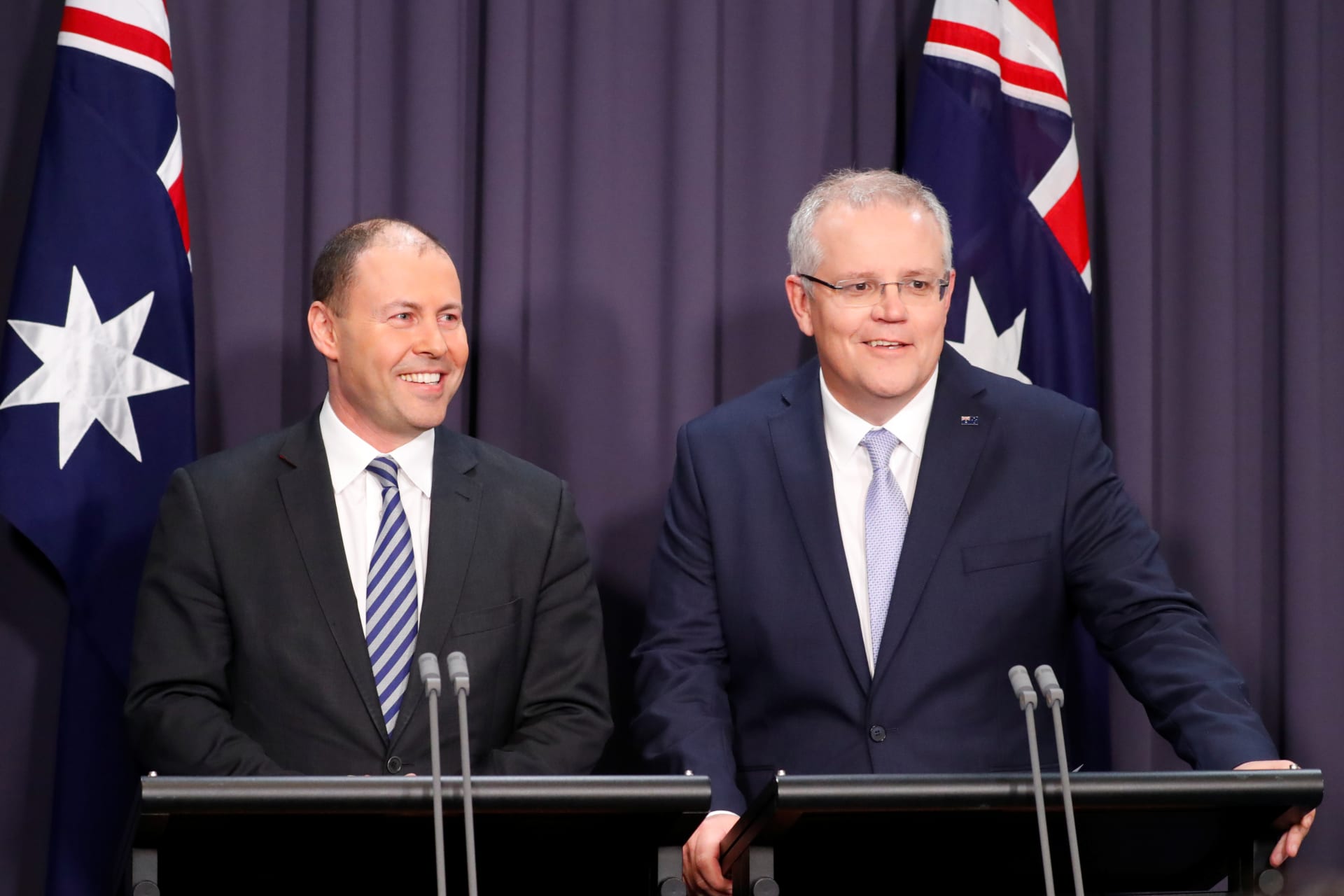 <p>The new Australian Prime Minister Scott Morrison (R) and his deputy Josh Frydenberg attend a news conference in Canberra, Australia on August 24, 2018. </p>