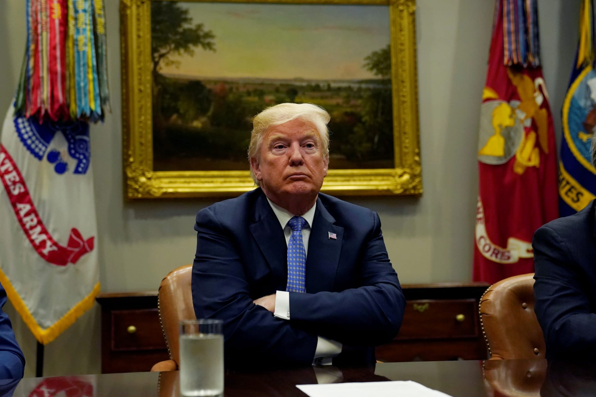 <p>U.S. President Donald Trump looks up while holding a roundtable on the Foreign Investment Risk Review Modernization Act at the White House in Washington, U.S., August 23, 2018. </p>
