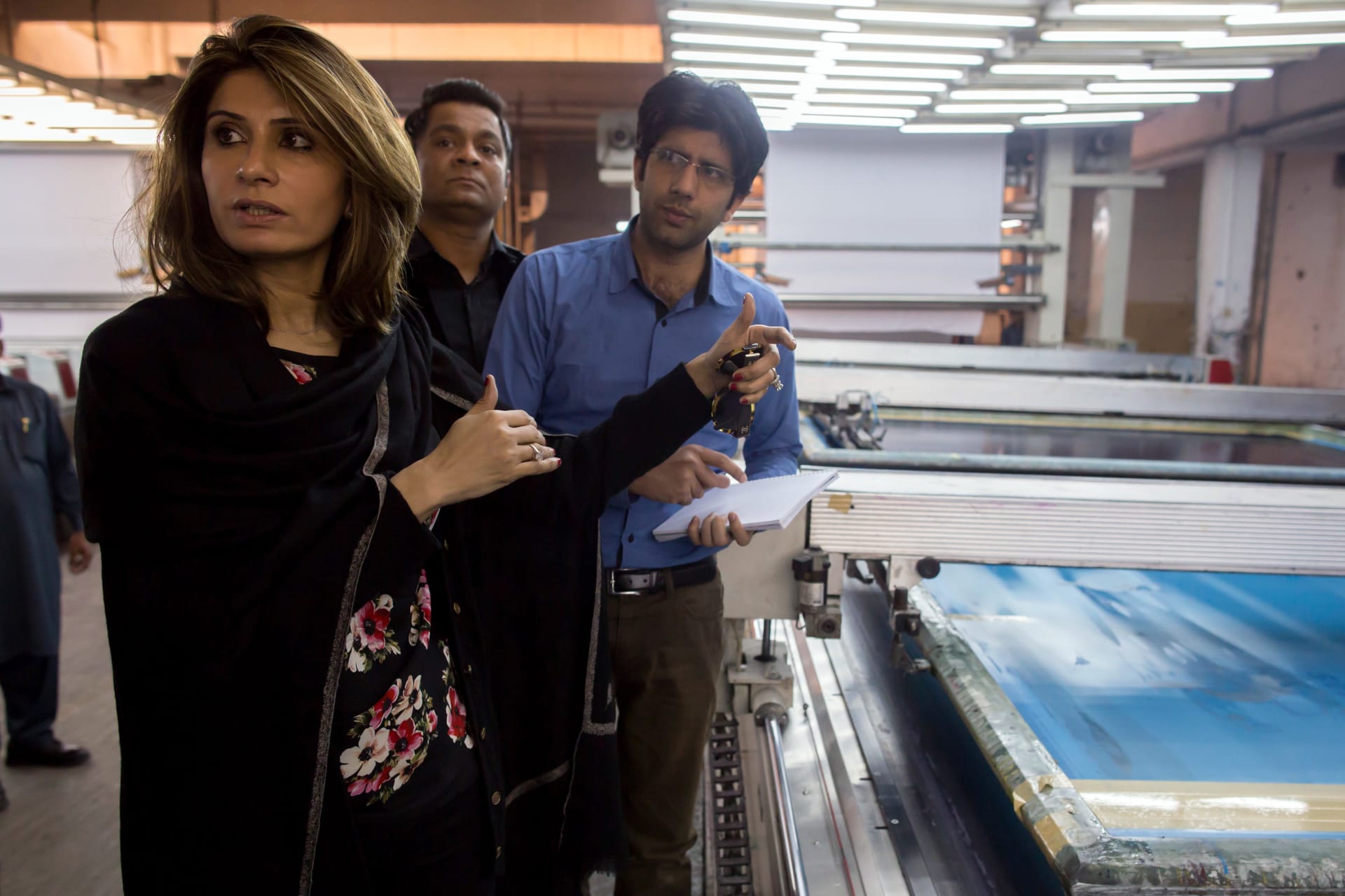 <p>Erum Ahmed, chief executive officer (CEO) of the textile retail brand So Kamal, talks to workers as she visits a factory in Faisalabad.</p>
