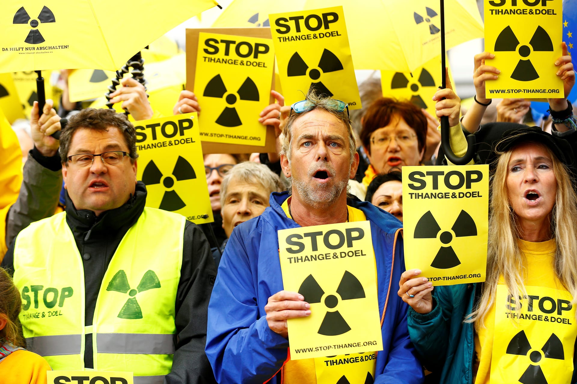 <p>People stage a protest against the nearby Belgian Tihange nuclear power station outside the town hall during a Charlemagne Prize ceremony in Aachen, Germany on May 10, 2018.</p>
