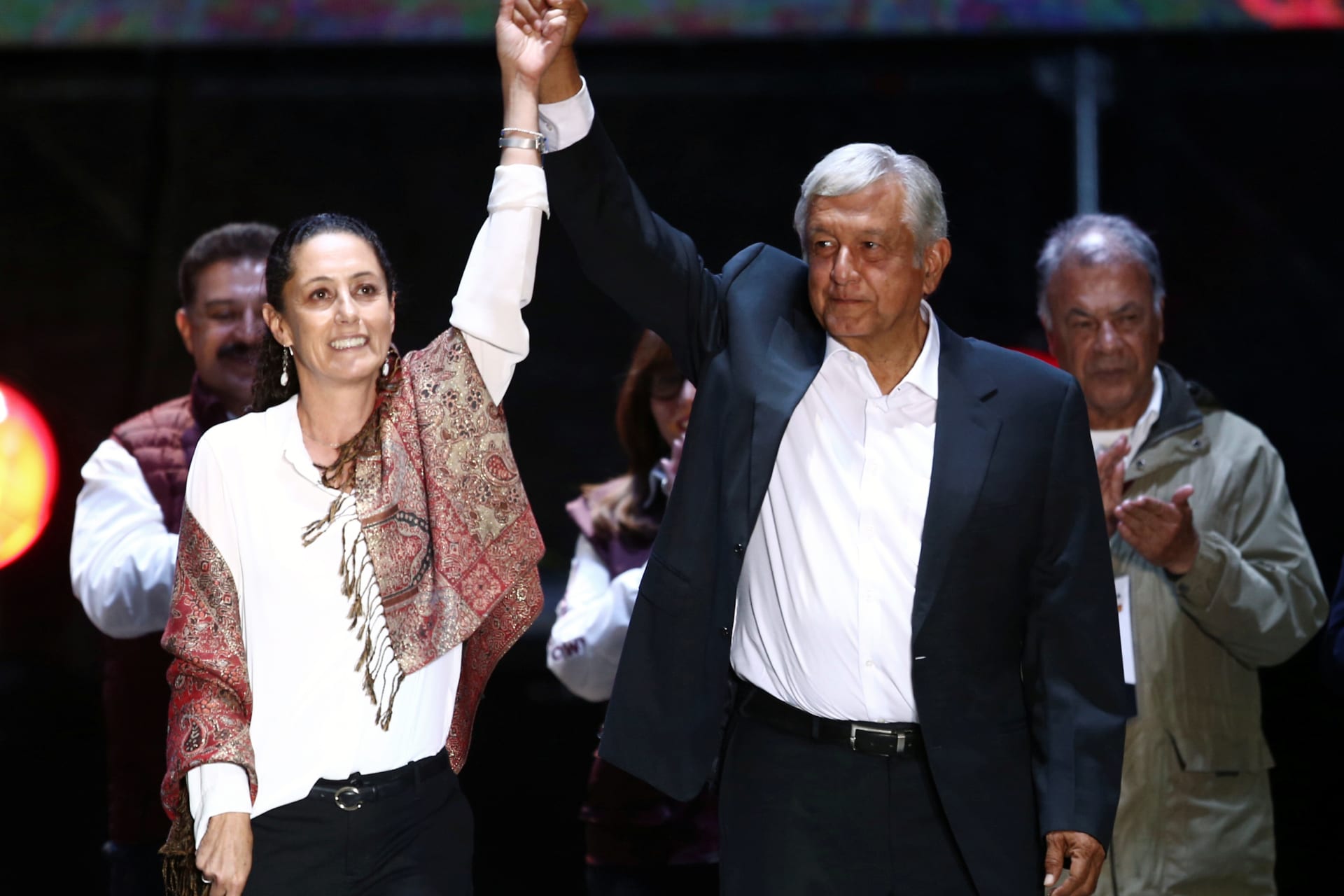 <p>Claudia Sheinbaum (L), candidate for Mexico City Mayor, and Mexican presidential candidate Andres Manuel Lopez Obrador gesture during a closing campaign rally.</p>
