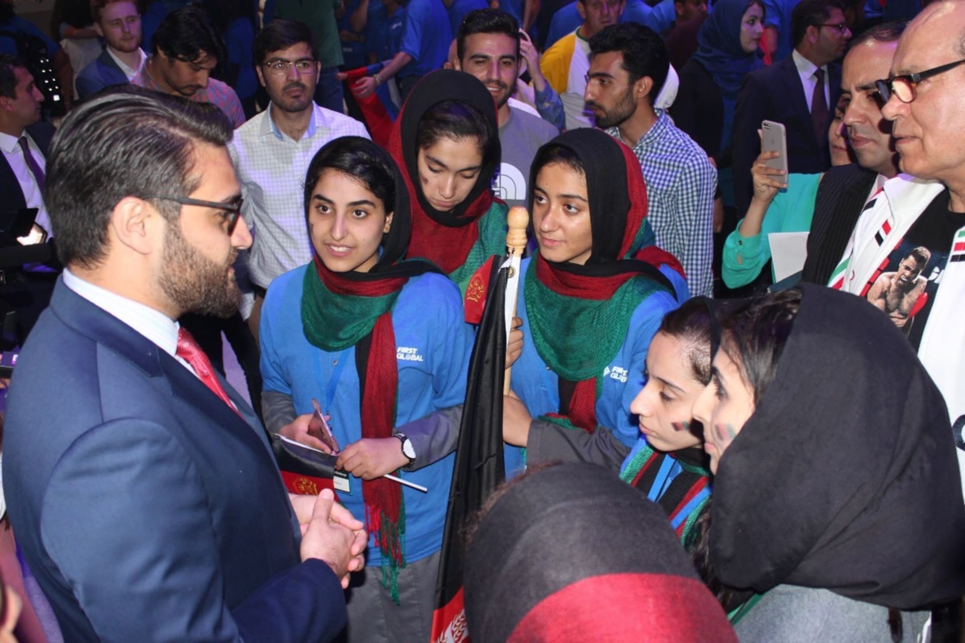 <p>Ambassador Hamdullah Mohib with the Afghan Girls’ Robotics Team. </p>
