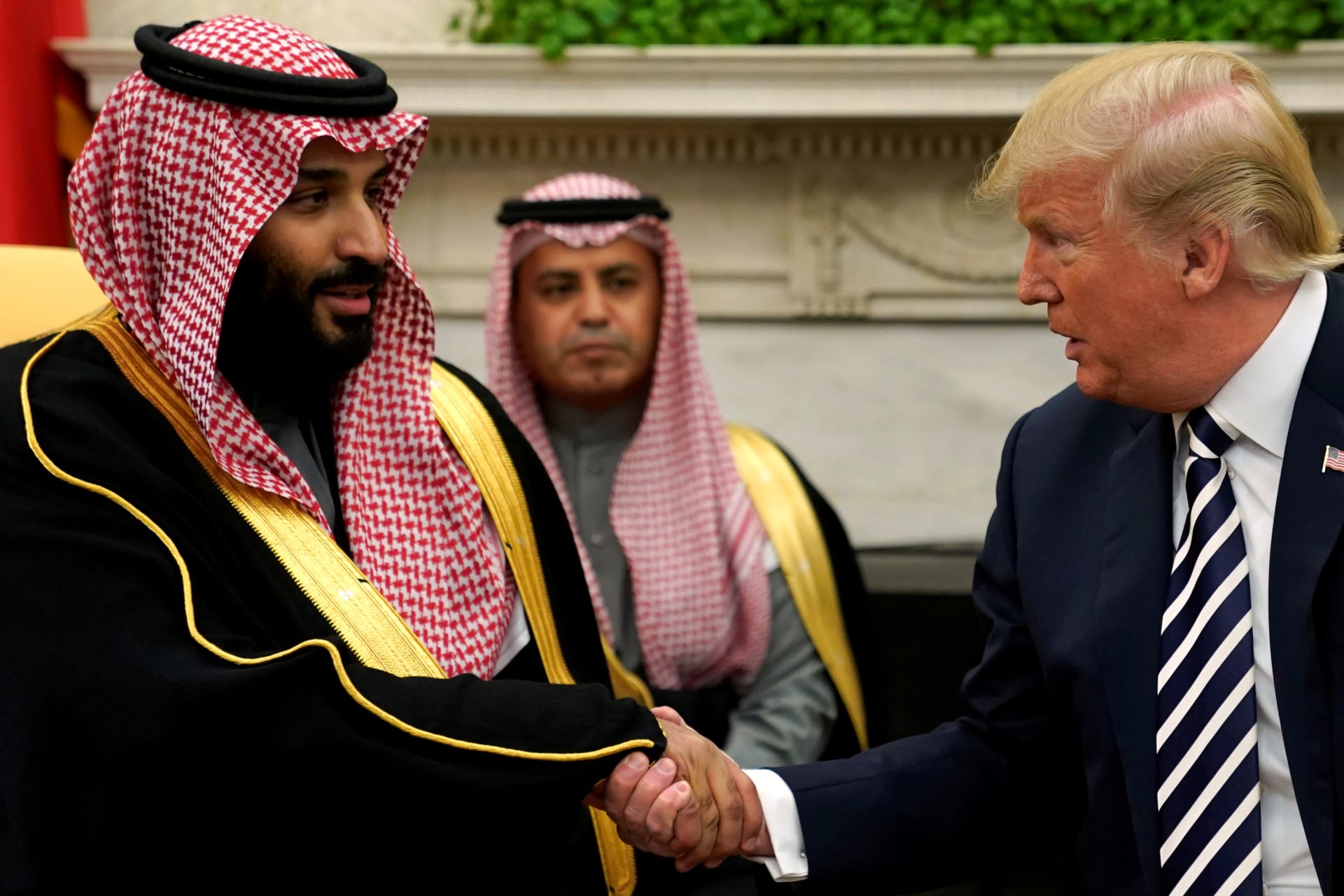 <p>FILE PHOTO: U.S. President Donald Trump shakes hands with Saudi Arabia’s Crown Prince Mohammed bin Salman in the Oval Office at the White House in Washington, DC, U.S. March 20, 2018.</p>

