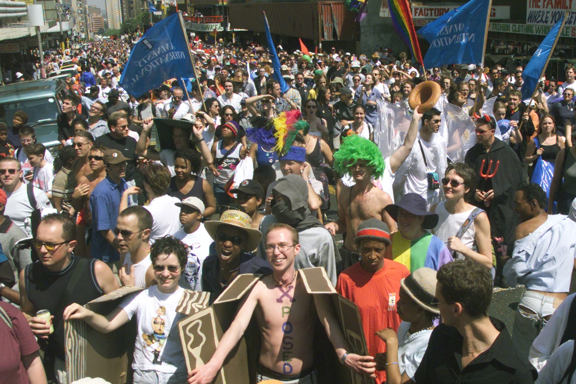 <p>Nearly 30,000 bisexuals, gays lesbians and other allies of diversity march 10 km (6 miles) through the streets of downtown Johannesburg on September 25, 1999, to commemorate the country’s 10th Pride Parade.</p>