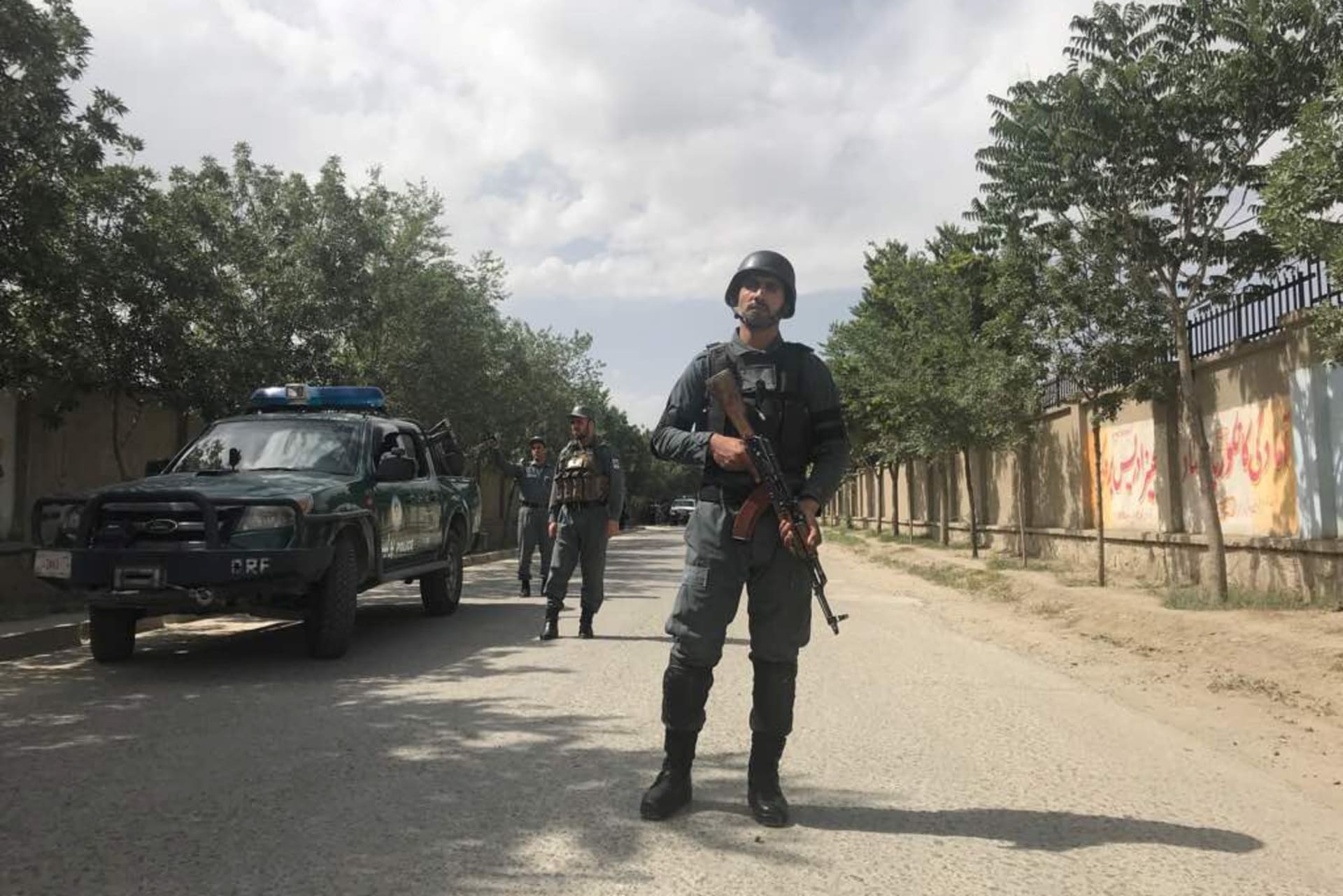 <p>An Afghan policeman keeps watch near the site of a suicide attack in Kabul, Afghanistan.</p>
