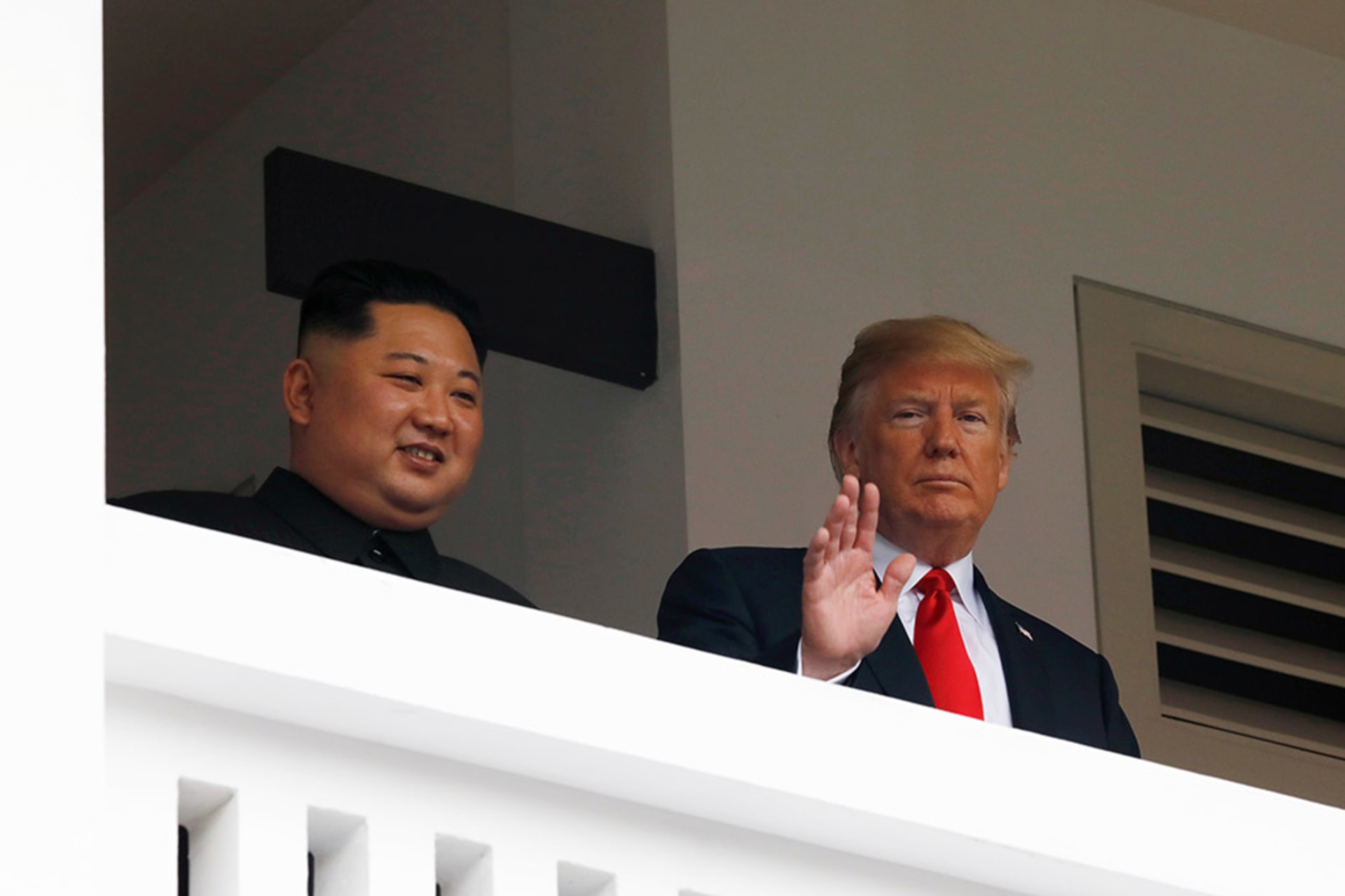 <p>U.S. President Donald Trump and North Korean leader Kim Jong Un react at the Capella Hotel on Sentosa island in Singapore, June 12, 2018. </p>
